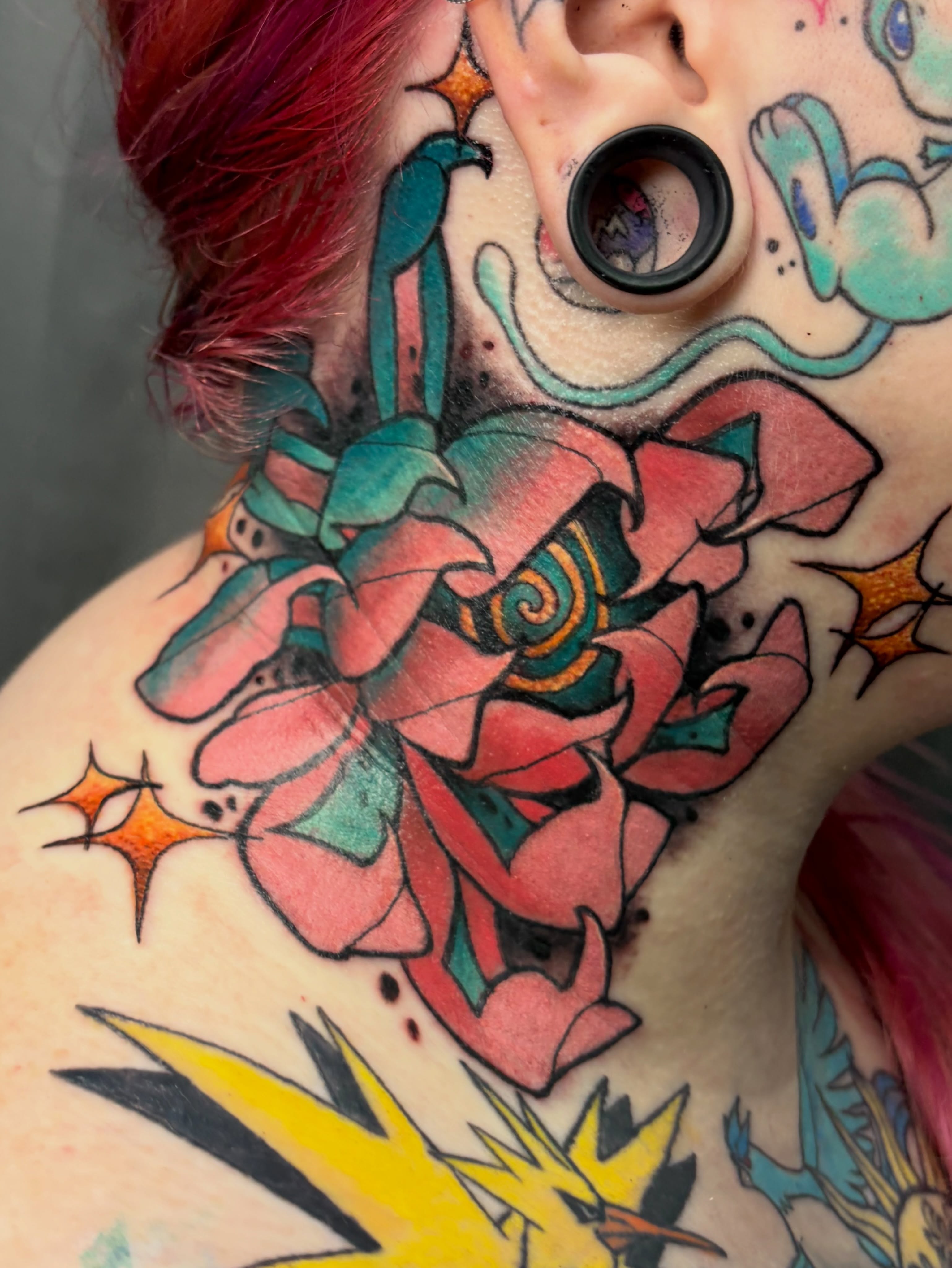 Floral American traditional tattoo on the neck by BodyArtByAlia