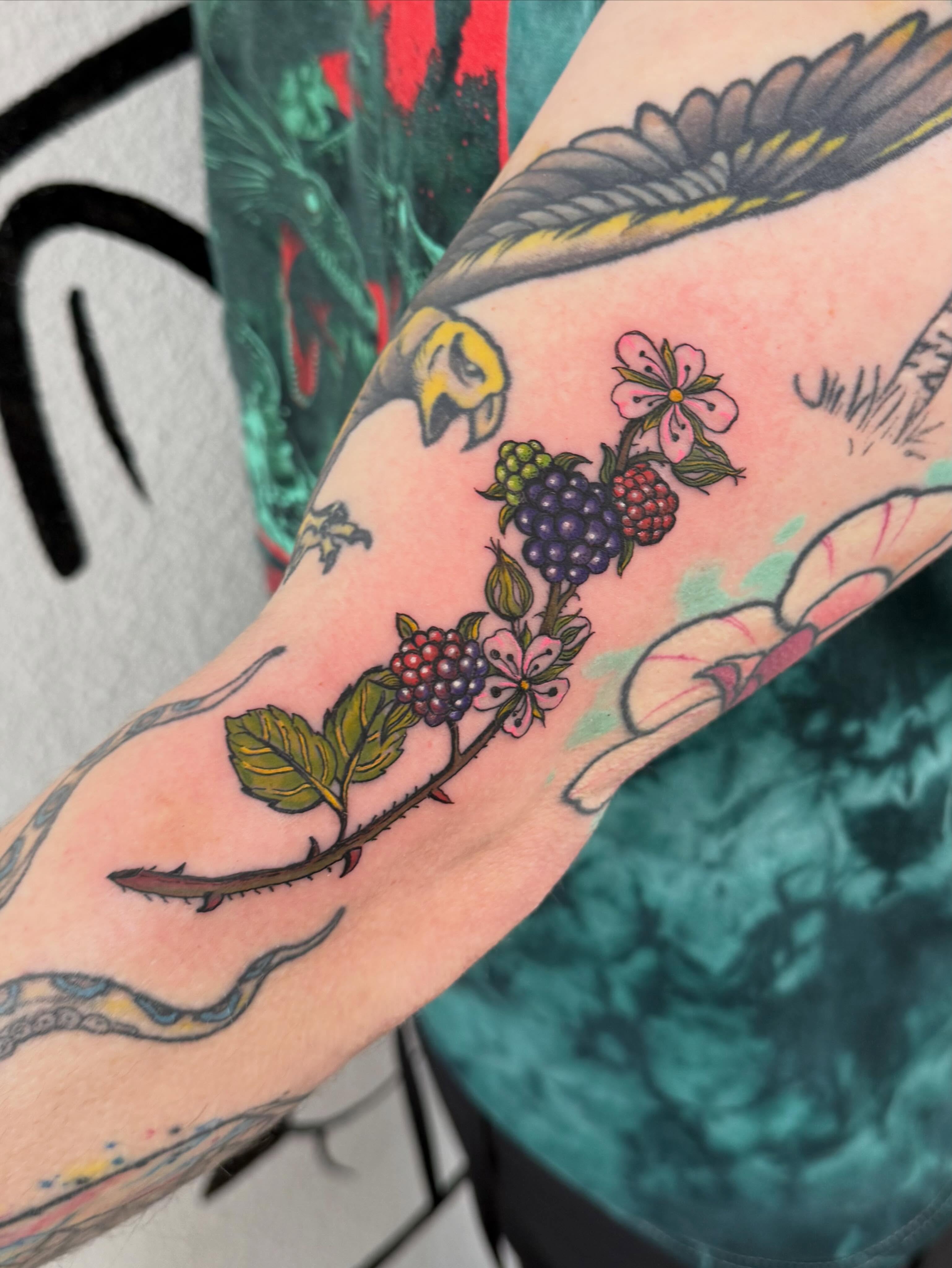 Berry vine American traditional tattoo on the forearm by Peggy
