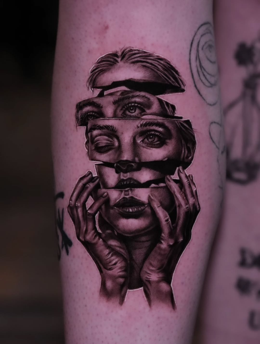 Surreal portrait surrealism tattoo on the forearm by Jake Barney