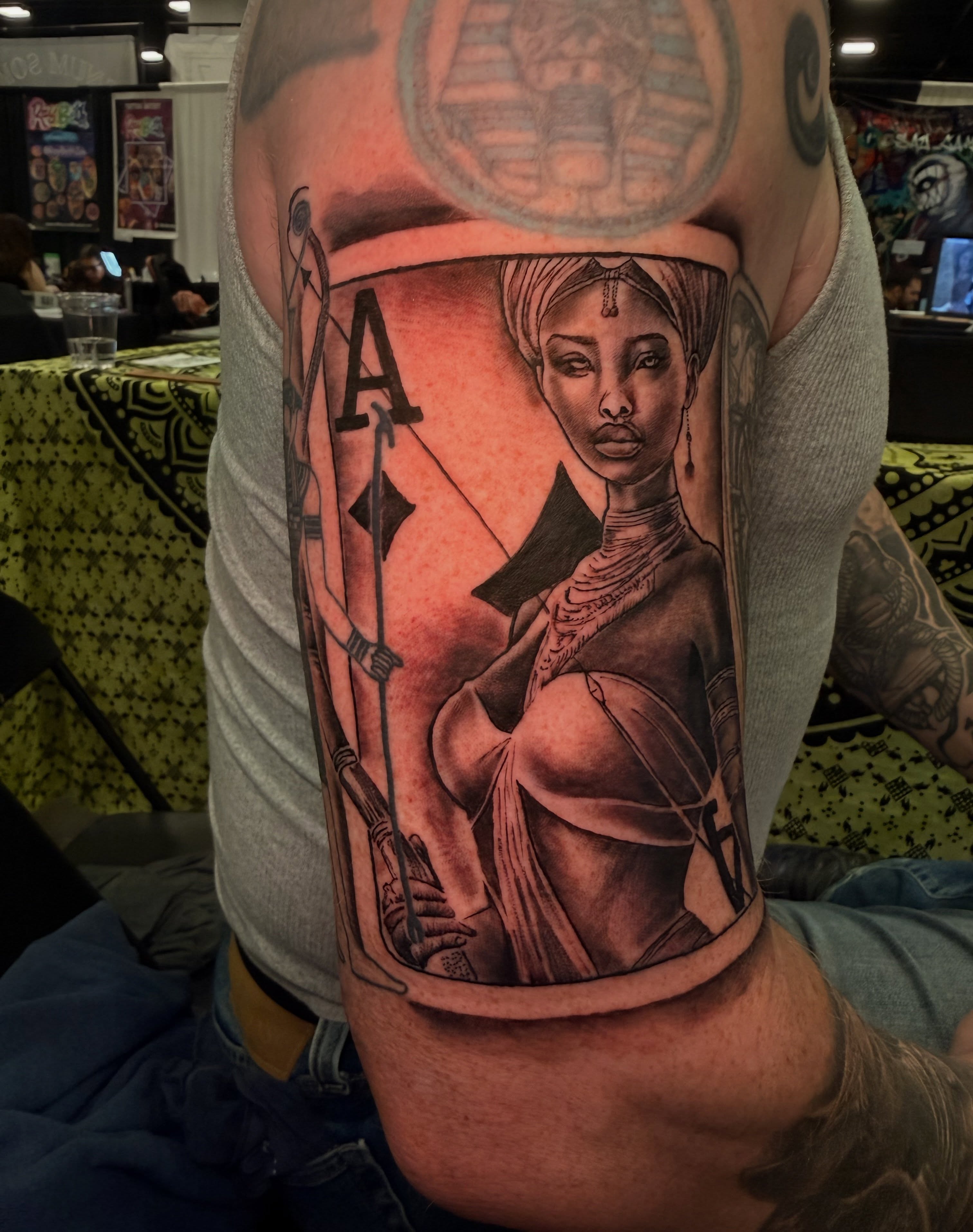 Playing card realism tattoo on the forearm by Butta