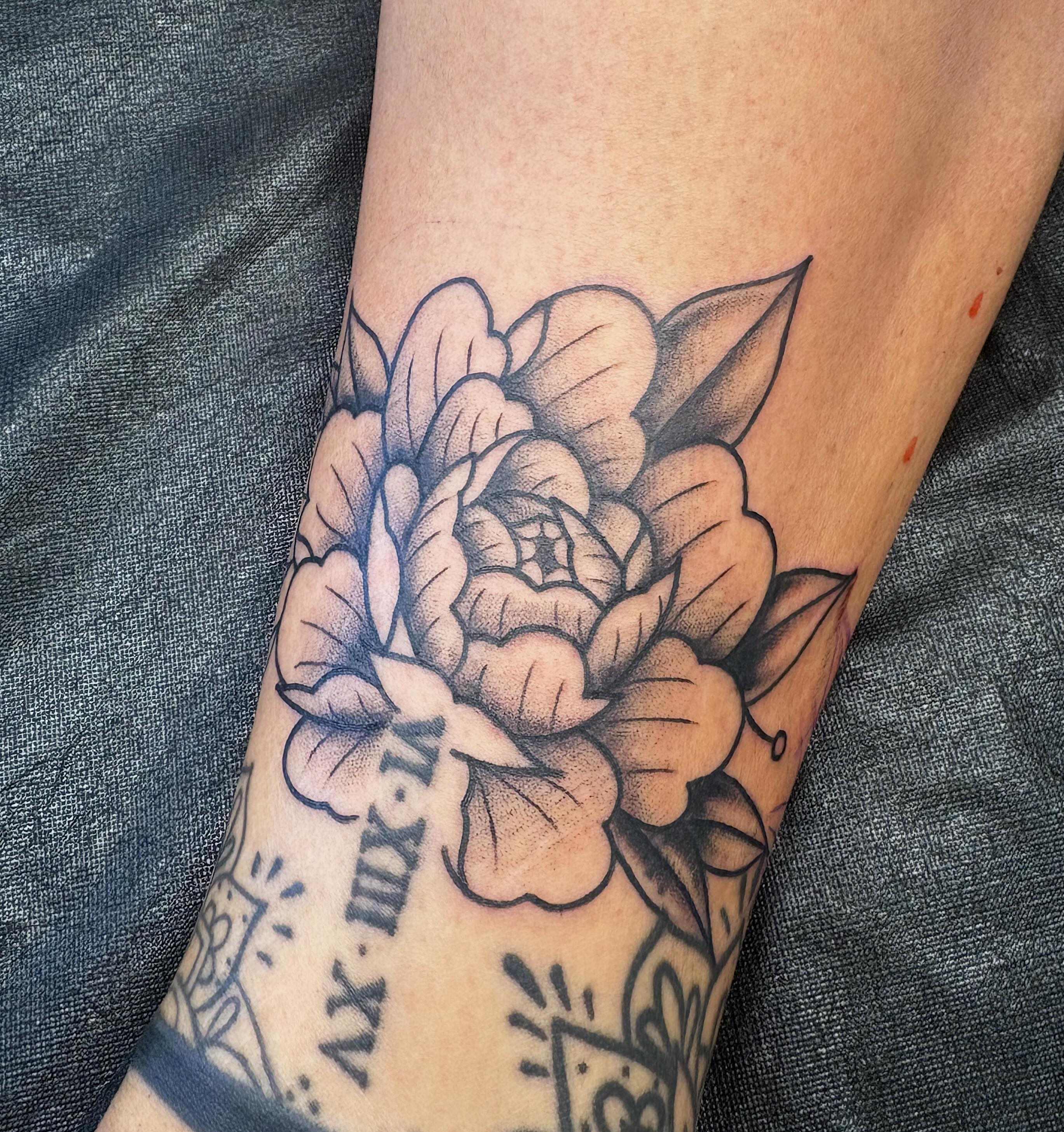 Peony flower dotwork tattoo on the forearm by Demi Flores 🖤