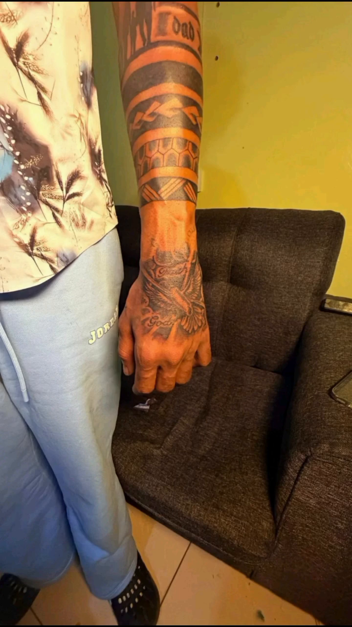 Eagle and geometric patterns on arm tattoo on the upper arm by Mwangaza Bodyworks, Uthiru, Nairobi Area, Kenya