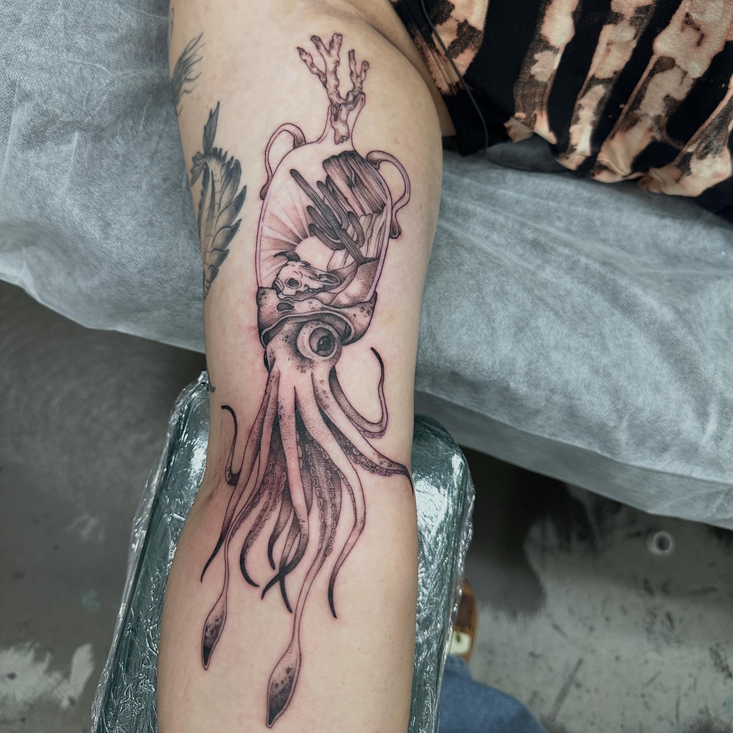 Squid realism tattoo on the forearm by Lyndsay Southgate