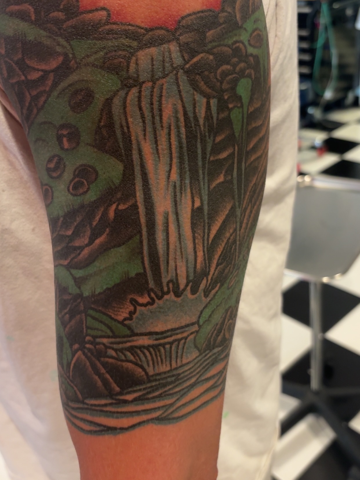 Waterfall realism tattoo on the forearm by Chris Prince Jr., Miamisburg, Ohio