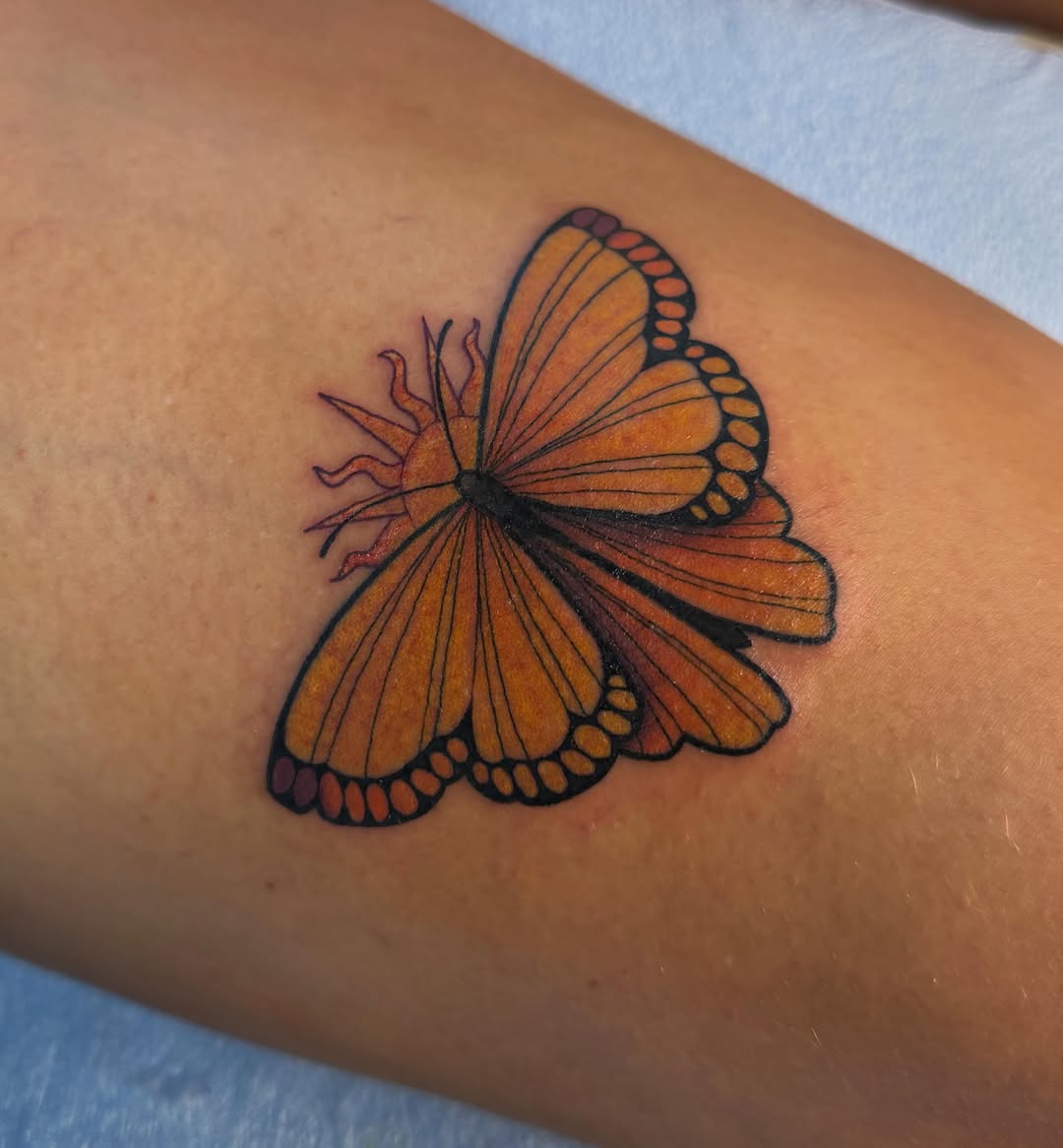 Monarch butterfly realism tattoo on the forearm by rocky love