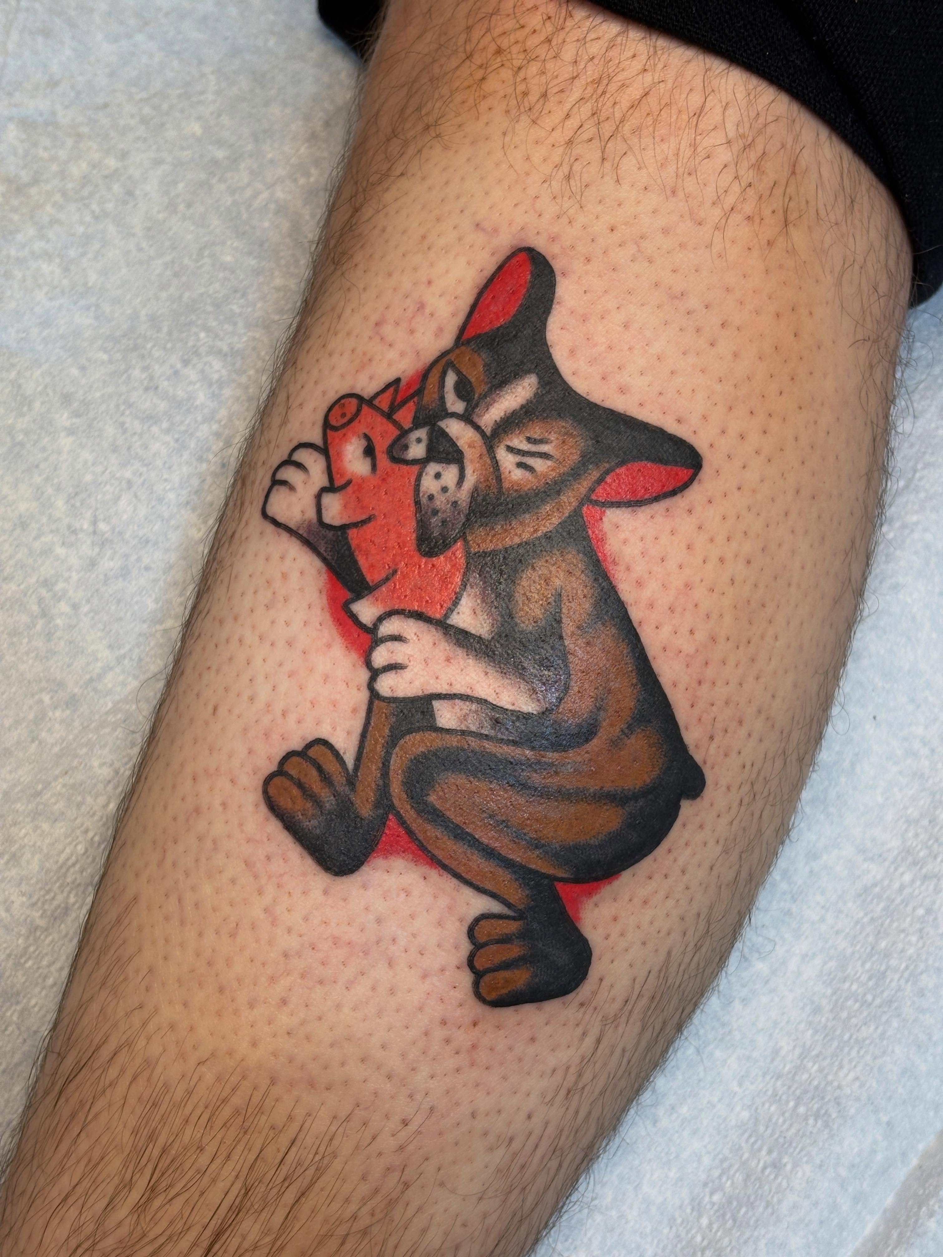 Cat holding carrot dotwork tattoo on the thigh by Sammy Tattoo, Austin, Texas