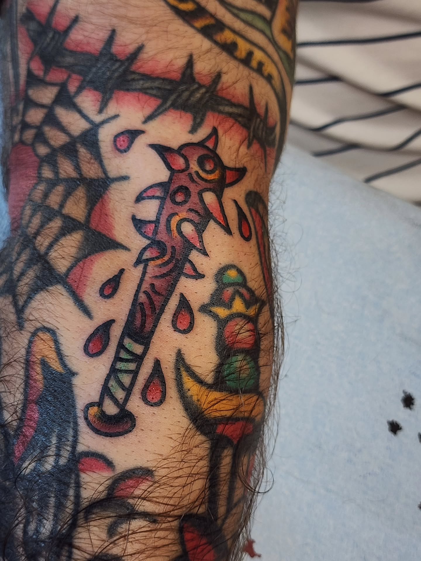 Barbed wire and bird American traditional tattoo on the forearm by πππππ