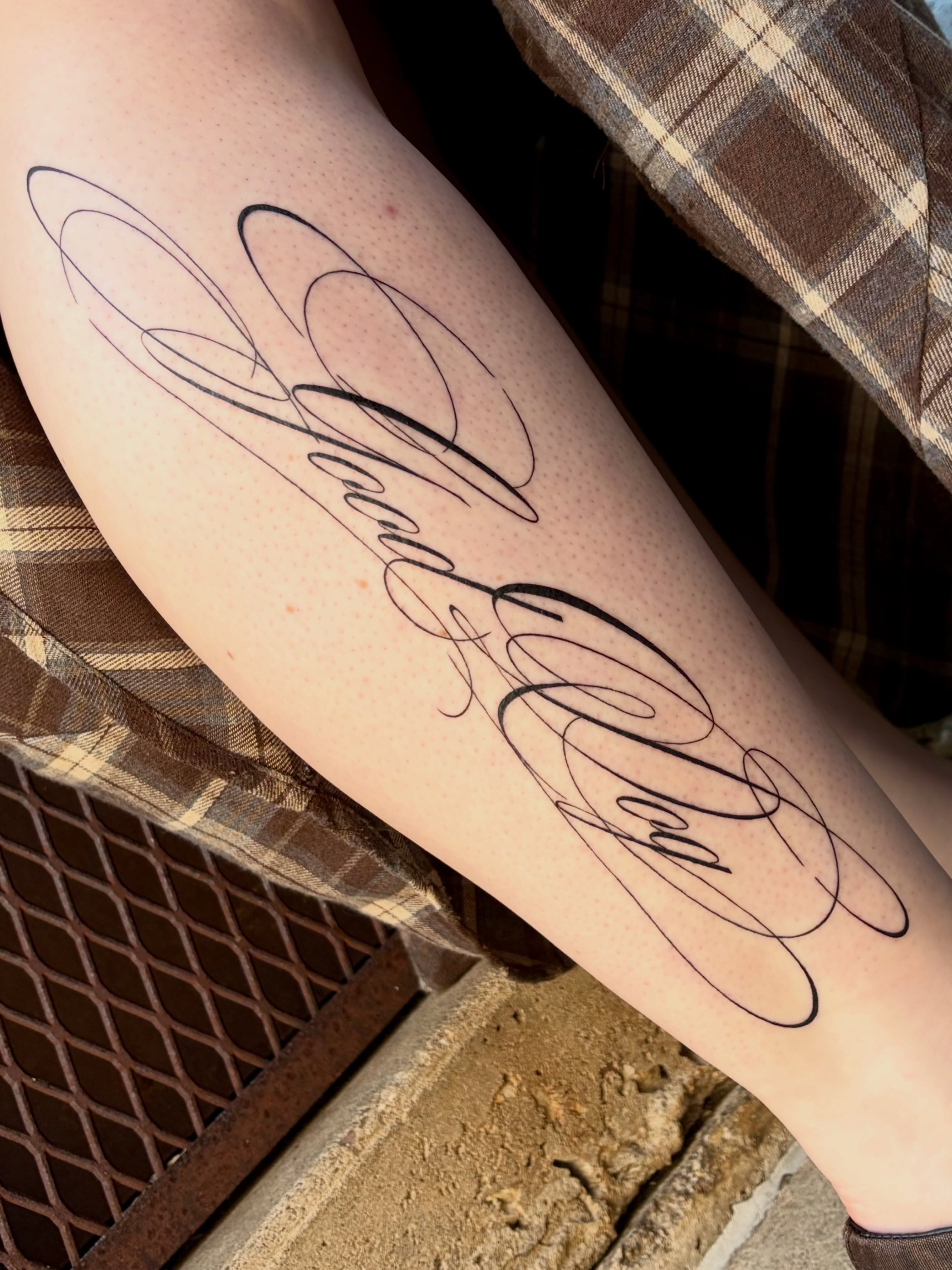 Script lettering lettering script tattoo on the forearm by Kylah Amin Tattoo