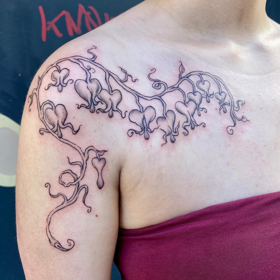 Bleeding heart vine cyber sigilism tattoo on the shoulder by °₊⊹ delia ✩ jane ೃ࿔*