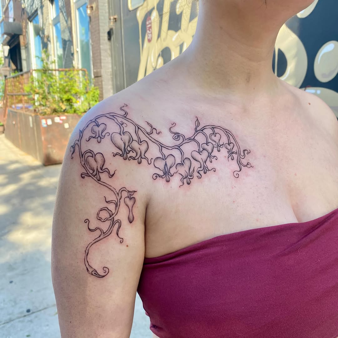 Bleeding heart vine cyber sigilism tattoo on the shoulder by °₊⊹ delia ✩ jane ೃ࿔*