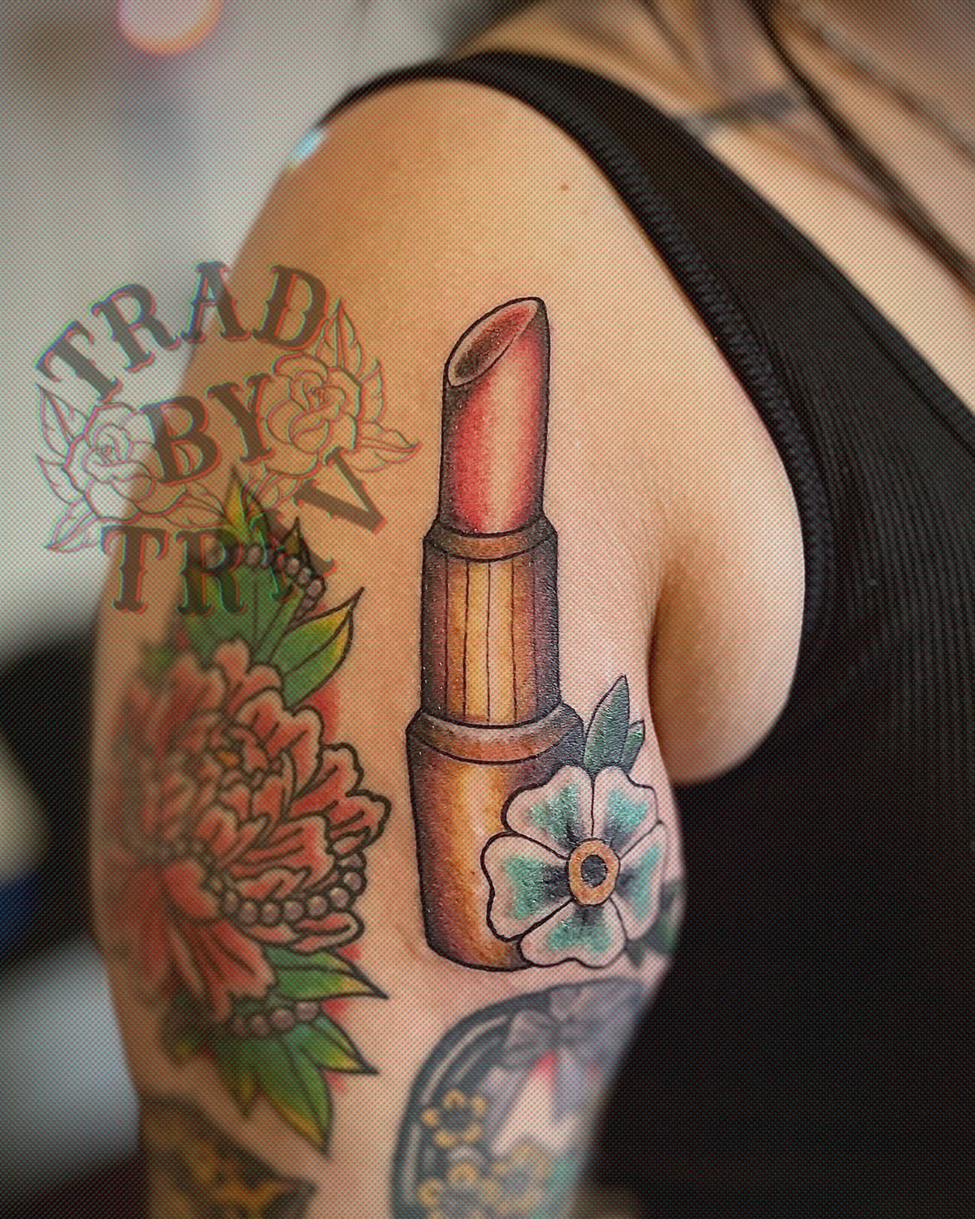 Lipstick American traditional tattoo on the shoulder by Travis B