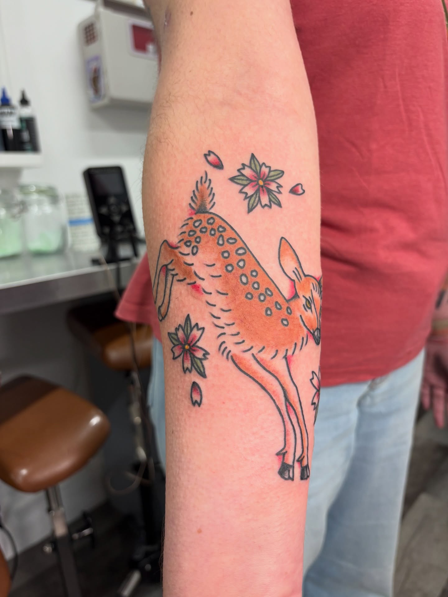 Deer and flowers dotwork tattoo on the forearm by Aysia Mankin-Wong, San Francisco, California