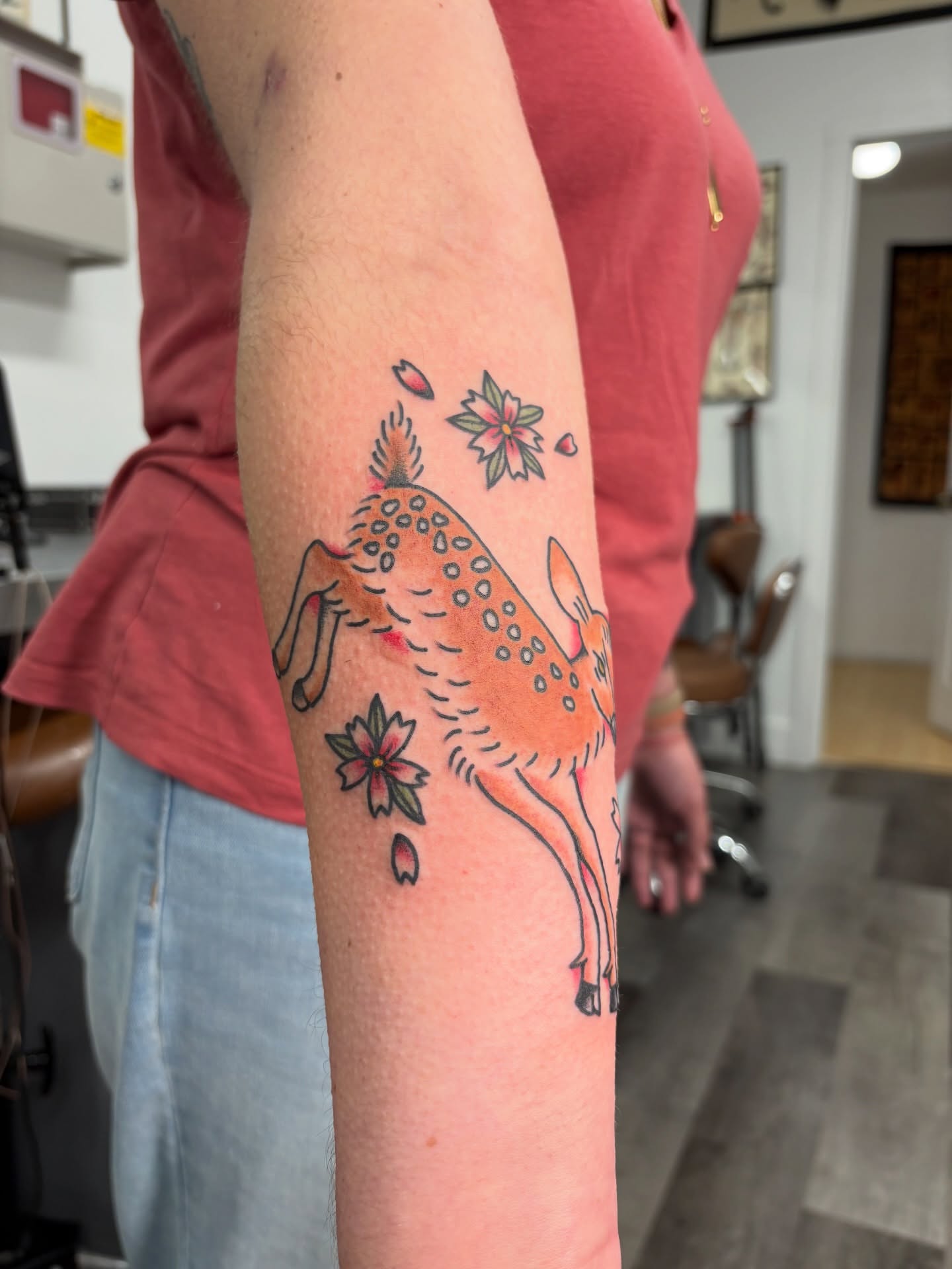 Deer and flowers dotwork tattoo on the forearm by Aysia Mankin-Wong, San Francisco, California