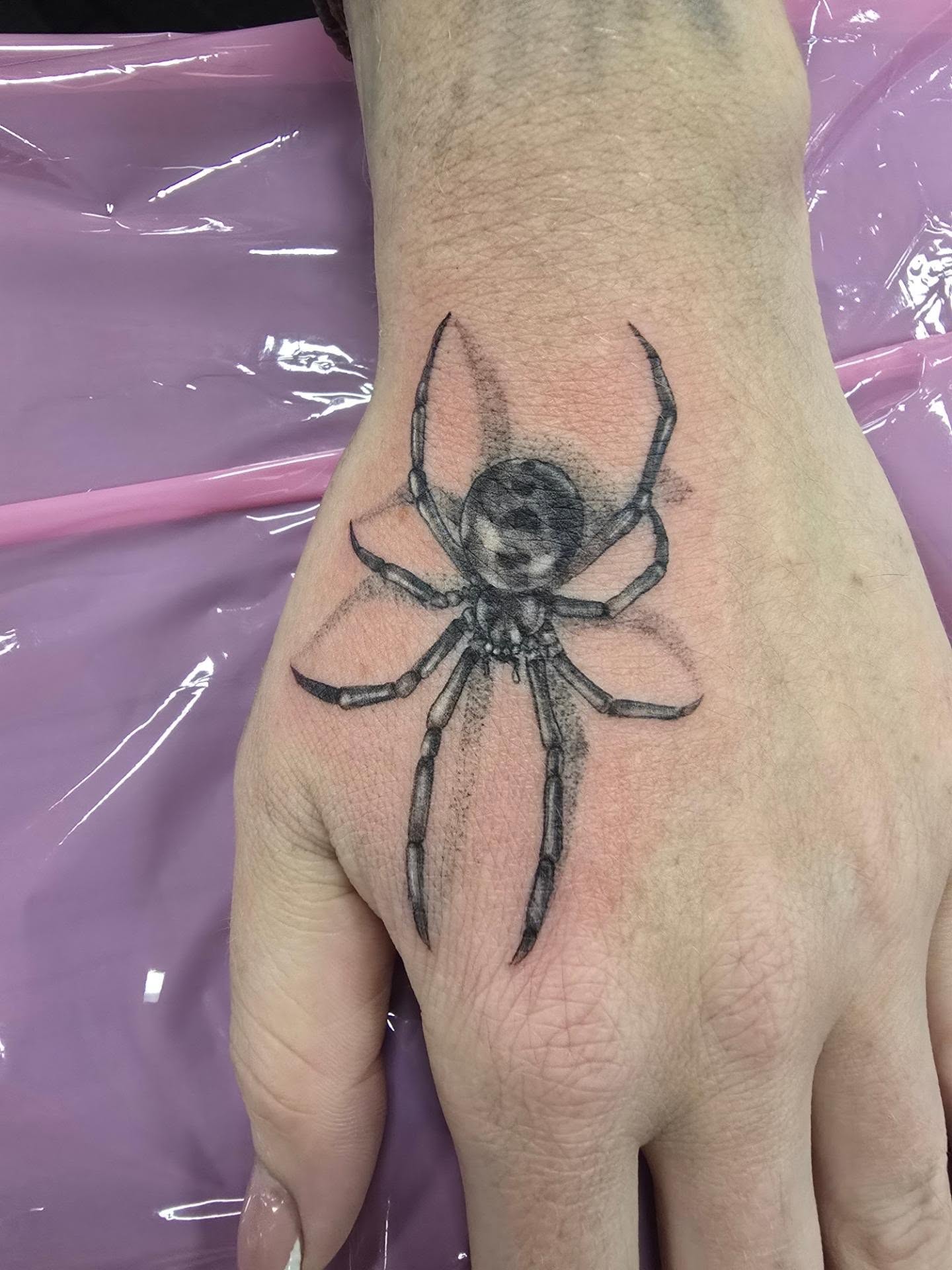 Spider realism tattoo on the hand by Rachel, Centereach, New York