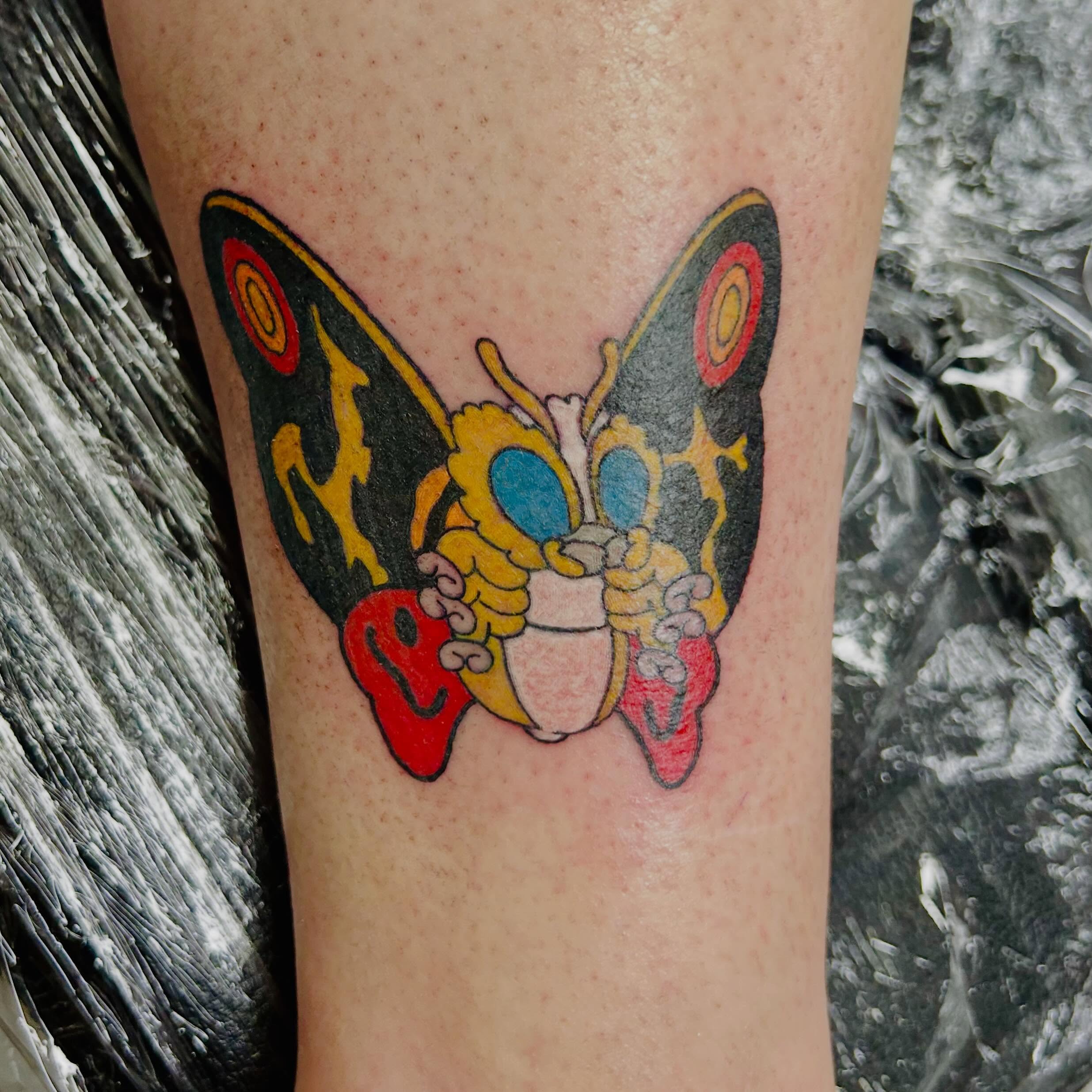 Butterfly new school tattoo on the forearm by Bjorn Bjornstad, Dubuque, Iowa