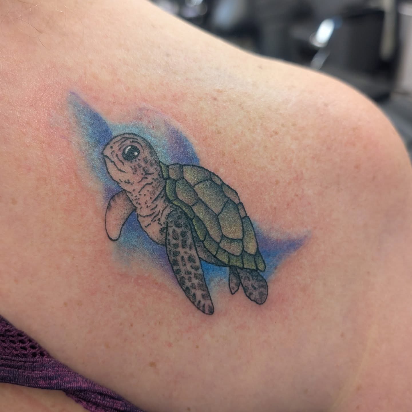 Sea turtle dotwork tattoo on the upper arm by Talia Zula, Loveland, Ohio