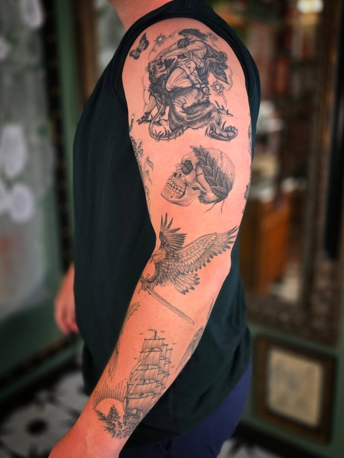 Pirate ship and crow American traditional tattoo on the forearm by Aaron Dor