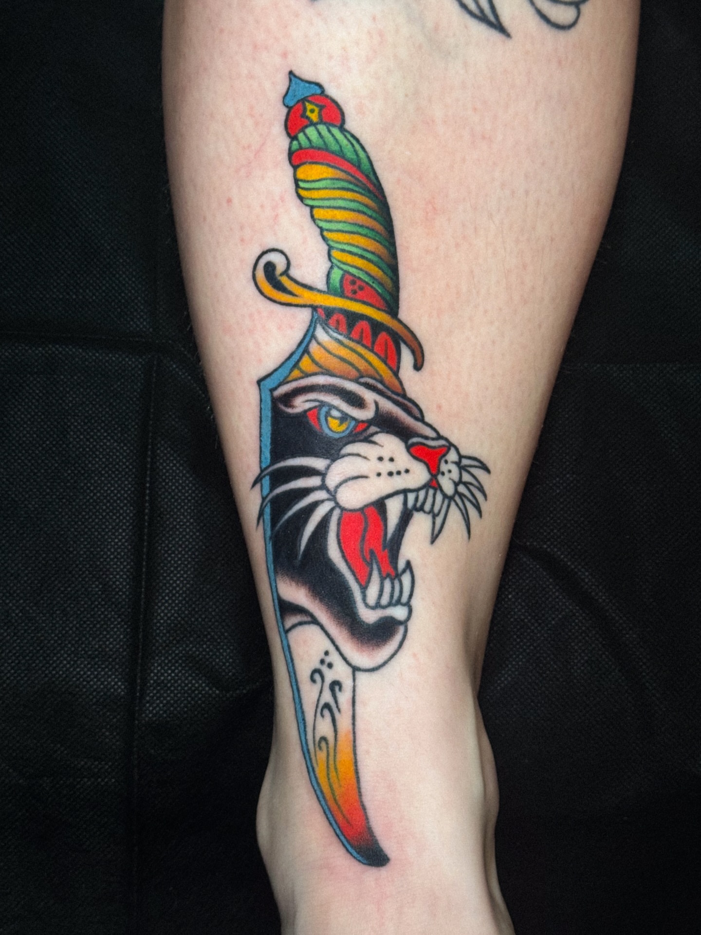 Panther knife American traditional tattoo on the forearm by Matthew - Tattoo Artist