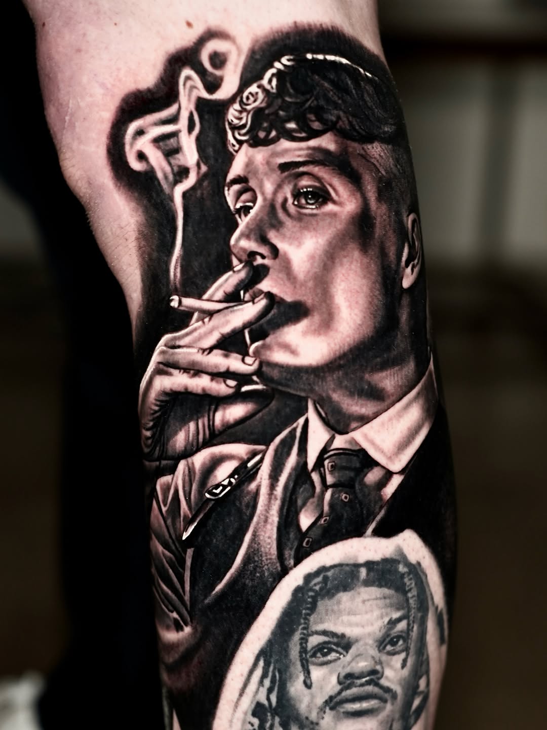 Portrait of a man smoking realism tattoo on the forearm by Joshua Phillips, Mansfield, Ohio