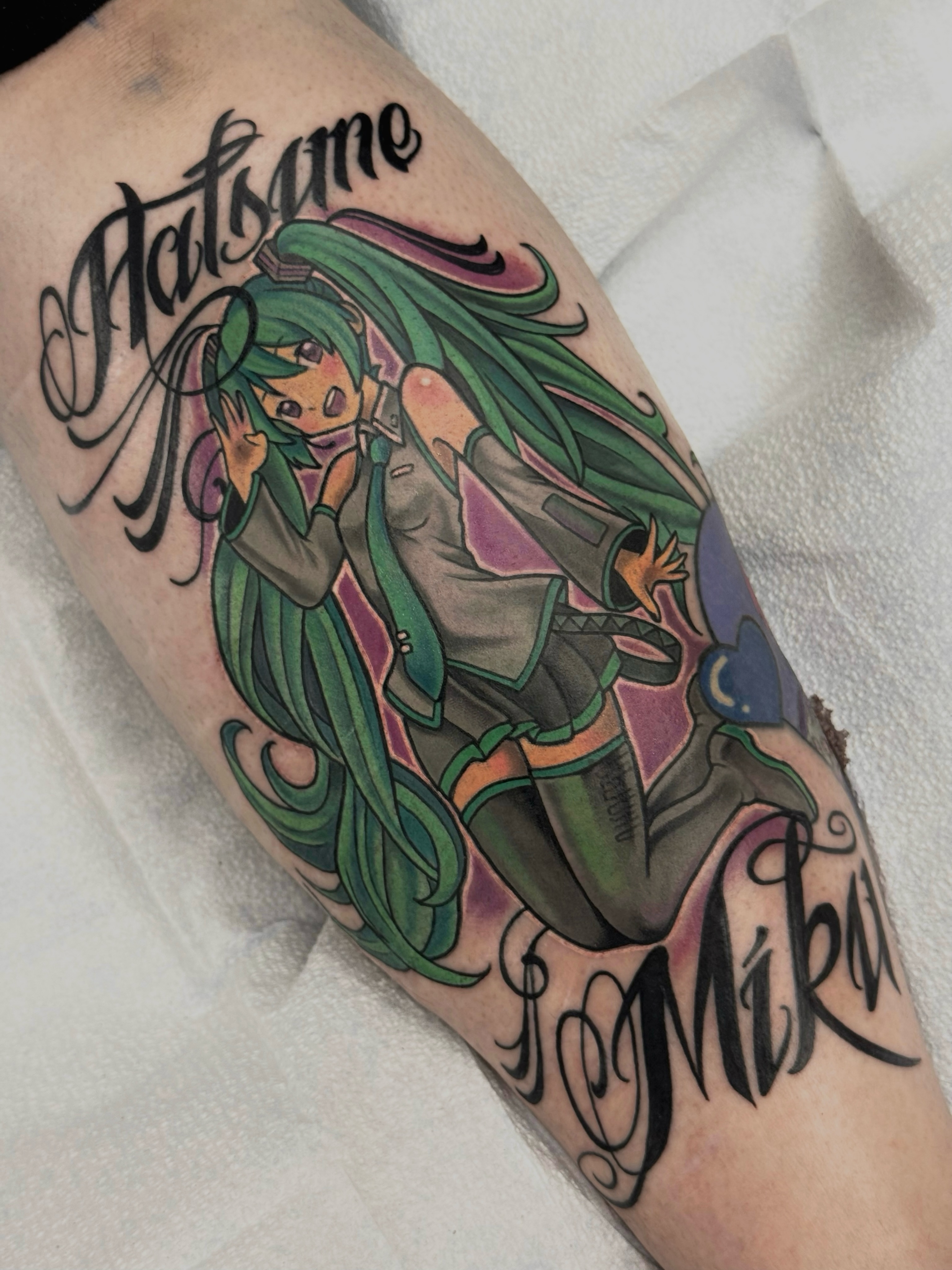 Hatsune Miku anime tattoo on the forearm by Suda