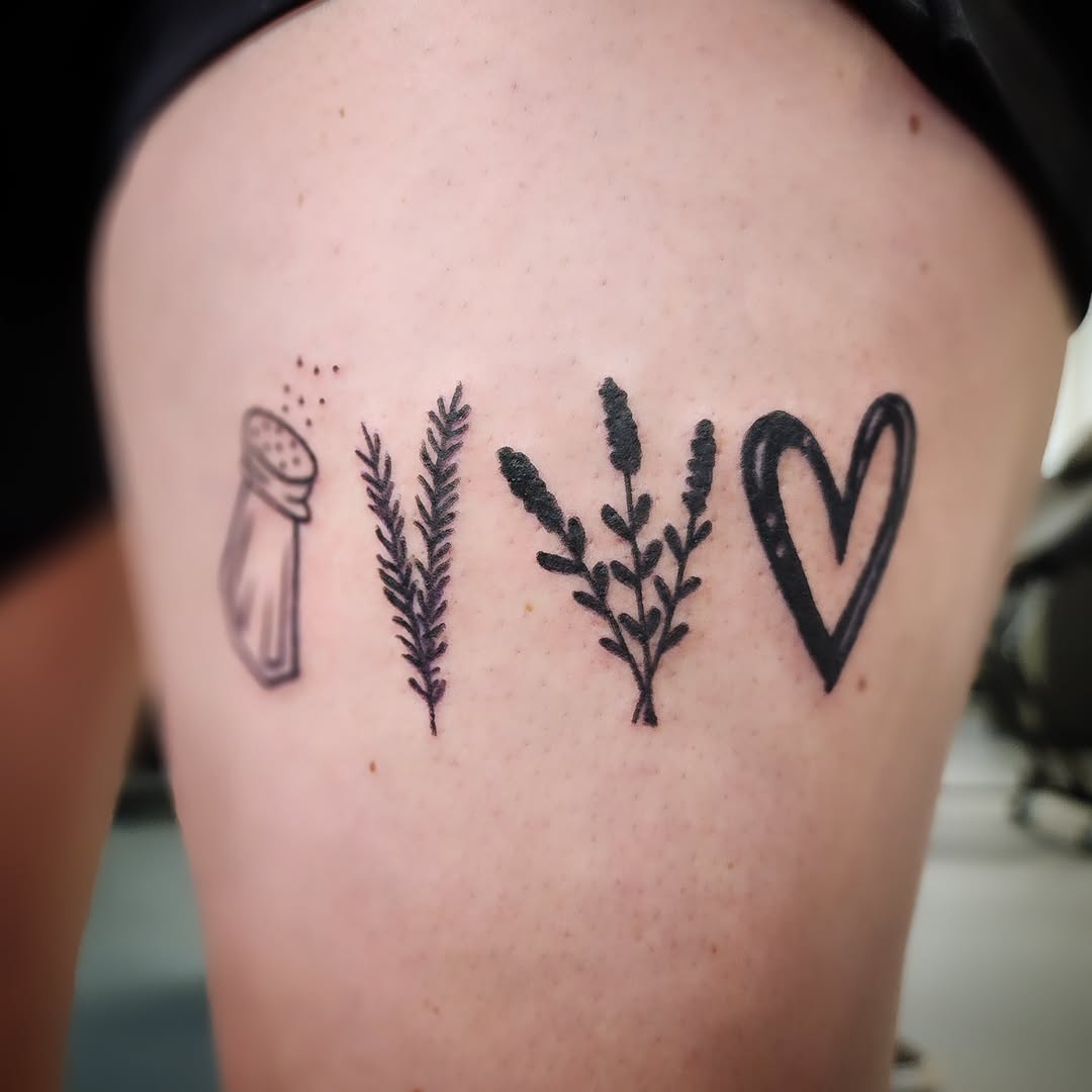 Salt shaker, herbs, and heart fine line tattoo on the thigh by Anntonietta Borzacchiello