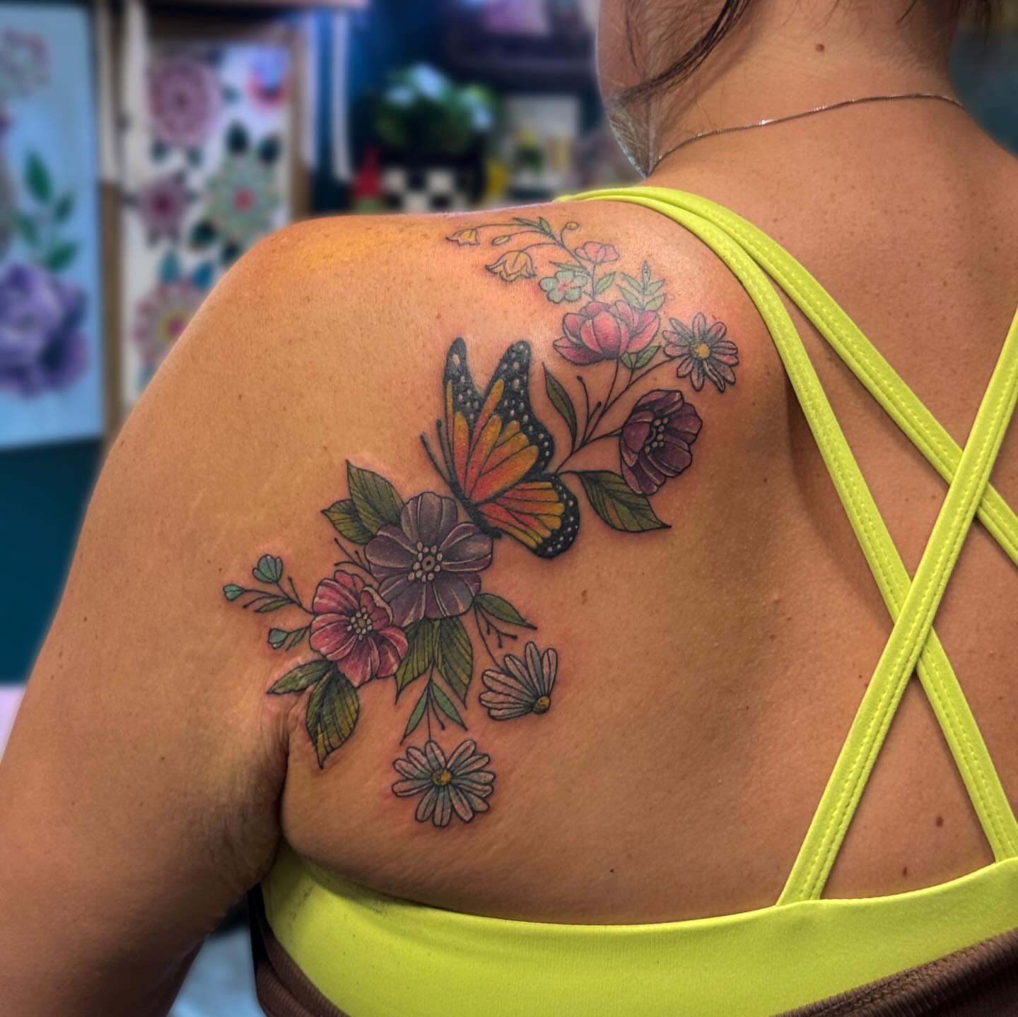 Butterfly and flowers realism tattoo on the shoulder by Kelsey 🖤 Tattoo Artist, Waterford Township