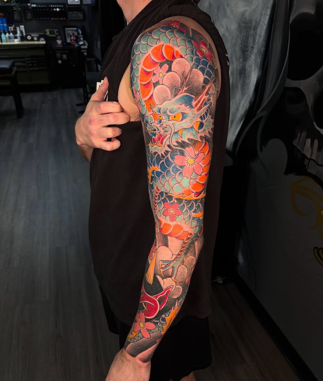 Dragon and cherry blossoms Japanese tattoo on the forearm by @seibastattoos, Virginia Beach, Virginia