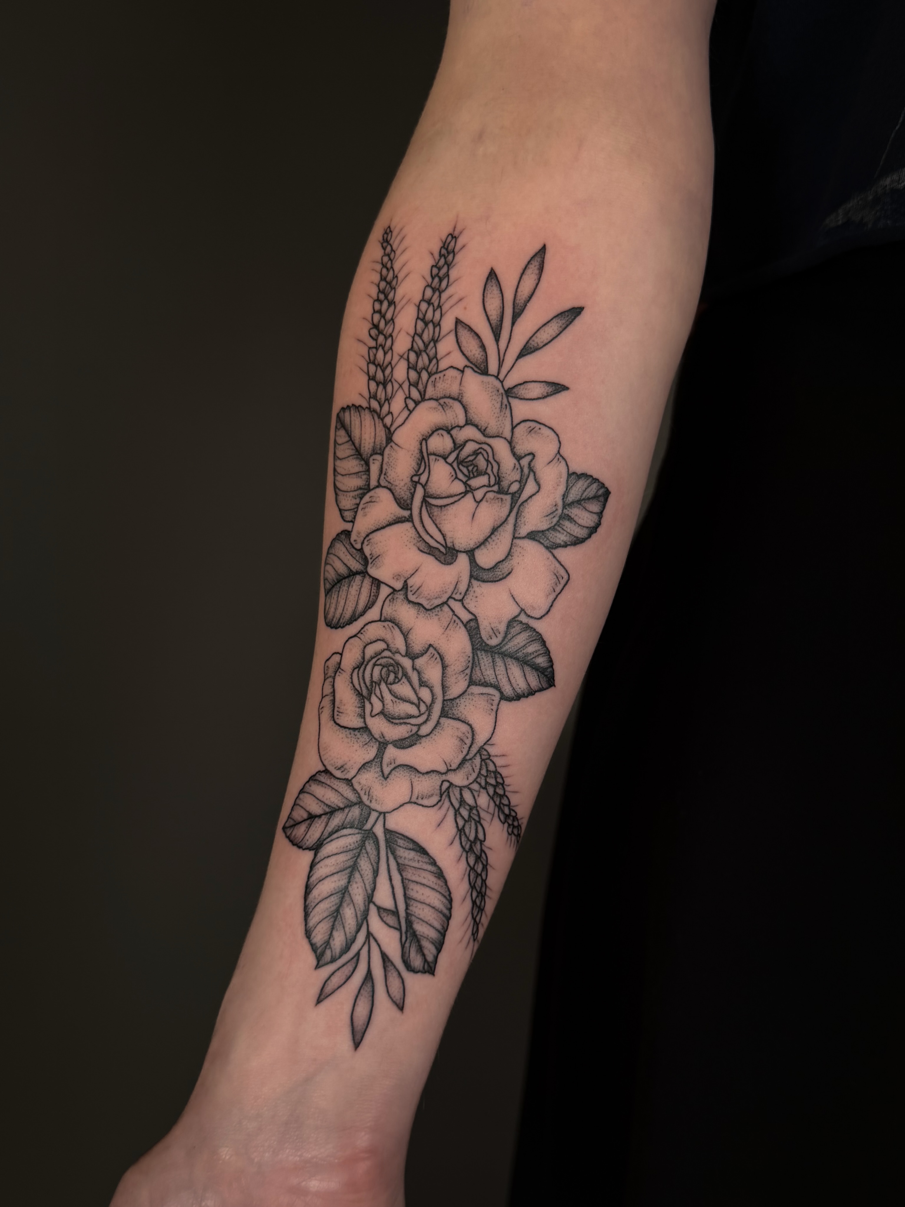 Roses black and grey tattoo on the forearm by Hannah, Portland, Oregon