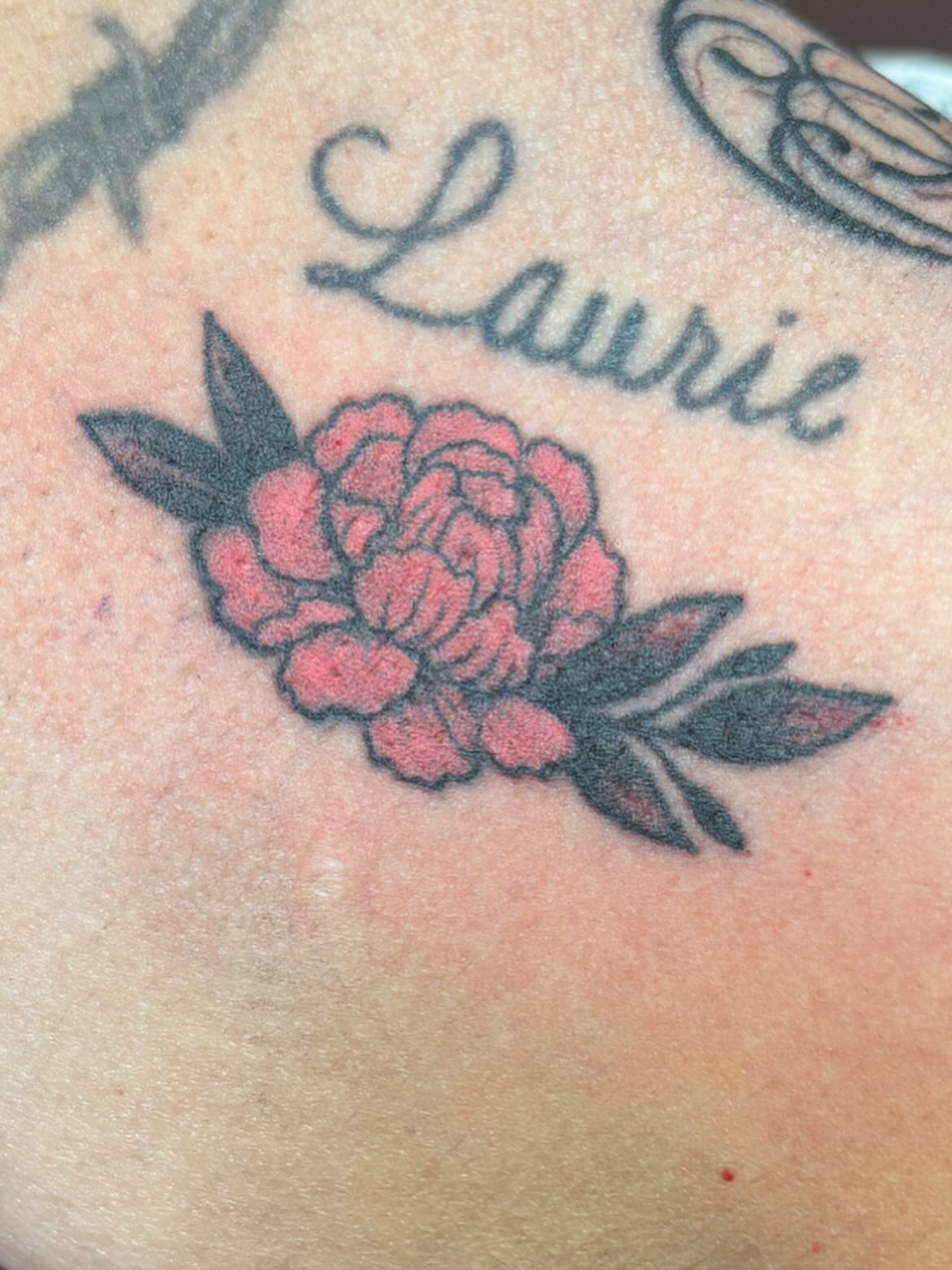 Peony American traditional tattoo on the shoulder by Scottbarrytattoos@gmail.com
