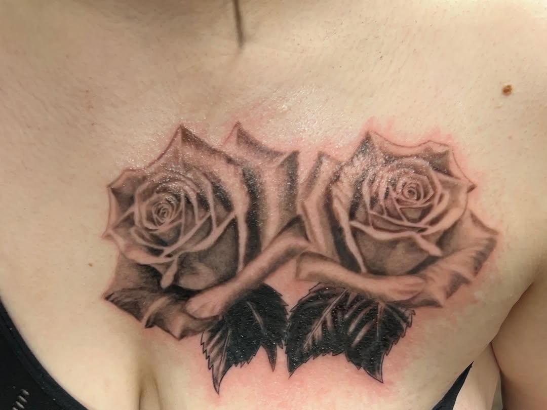 Two roses dotwork tattoo on the chest by Willi Tattoos👹