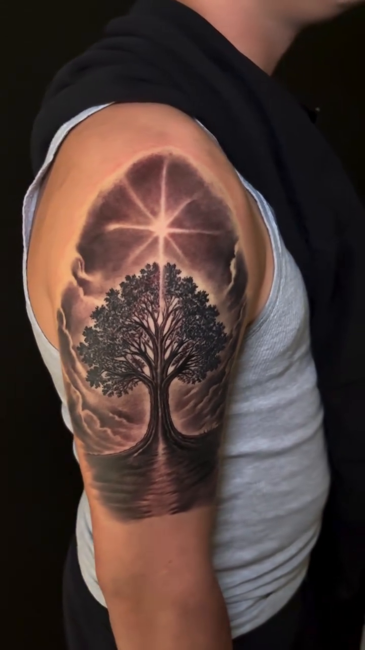 Tree of Life with star realism tattoo by Ian Vanderwerff