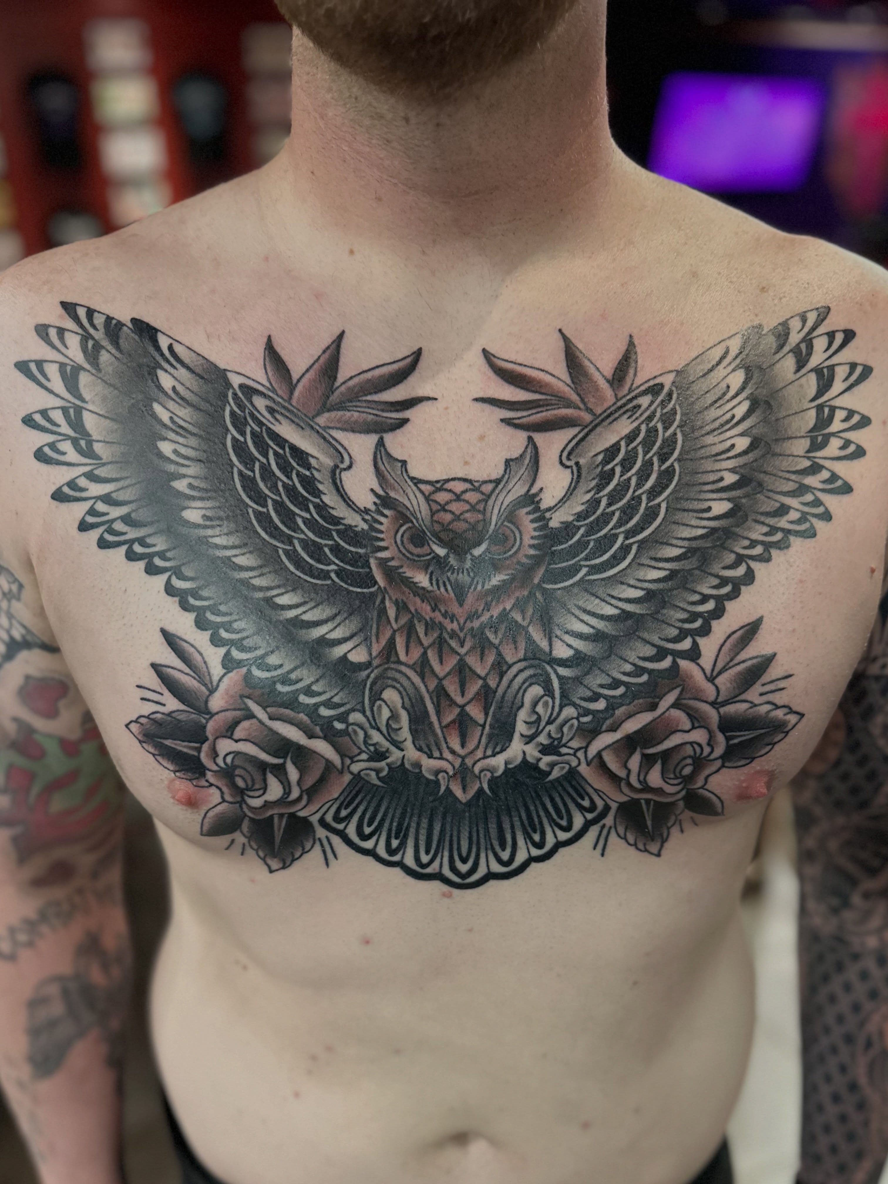 Owl American traditional tattoo on the chest by Walk-in American Traditional Tattoos Las
