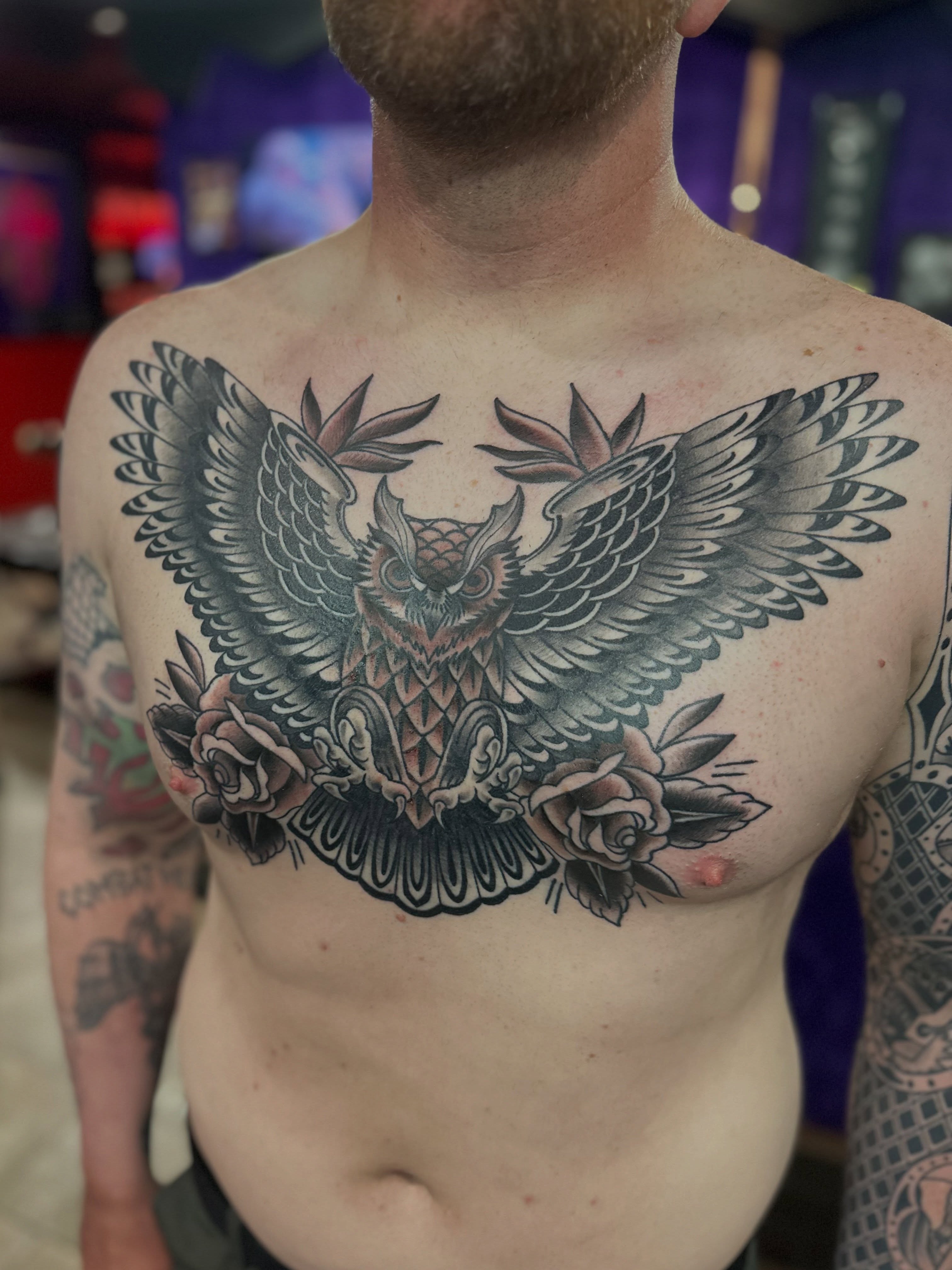 Owl and roses American traditional tattoo on the chest by Walk-in American Traditional Tattoos Las