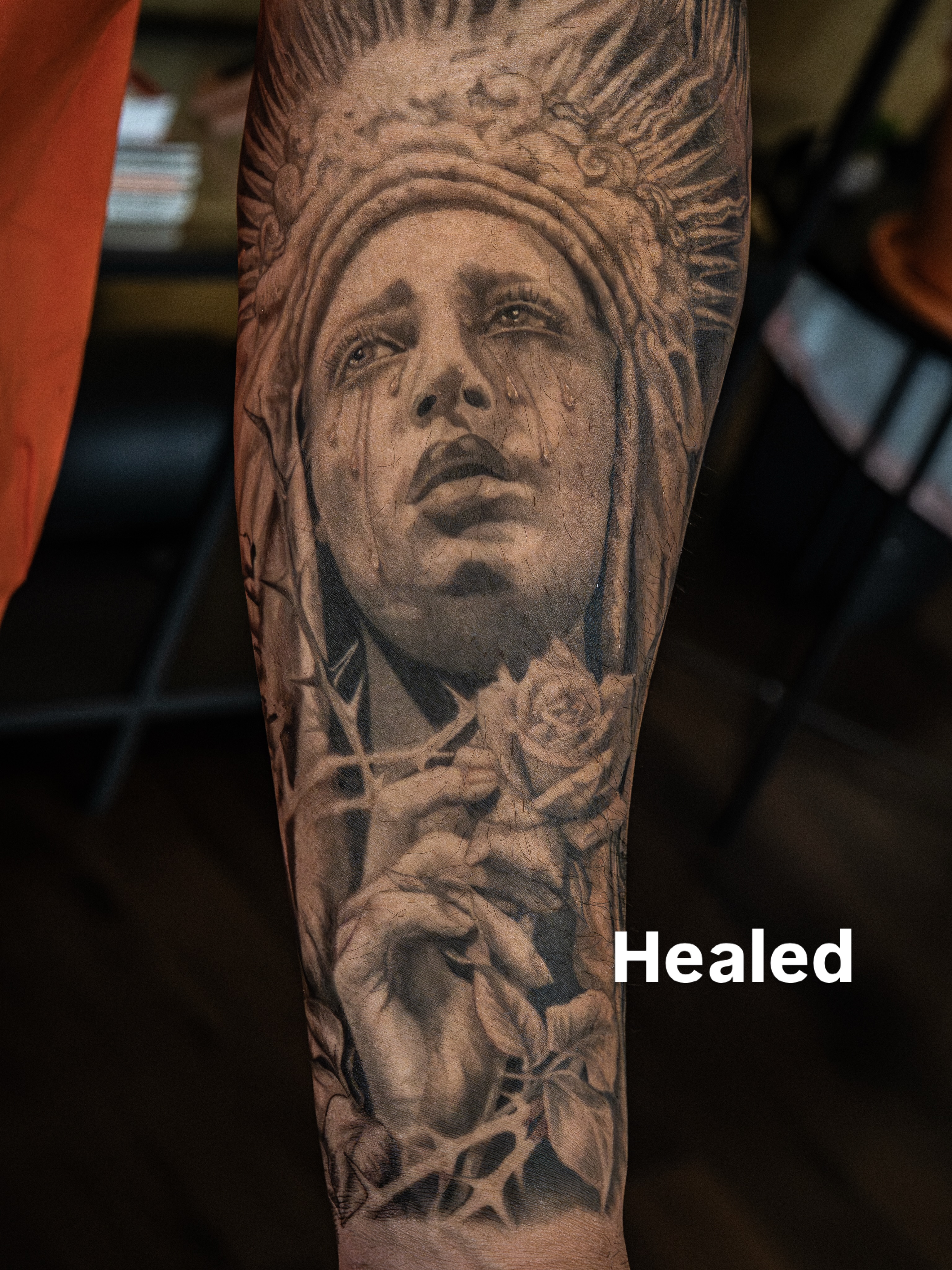 Religious figure with crown of thorns realism tattoo on the forearm by Simon Pouliot