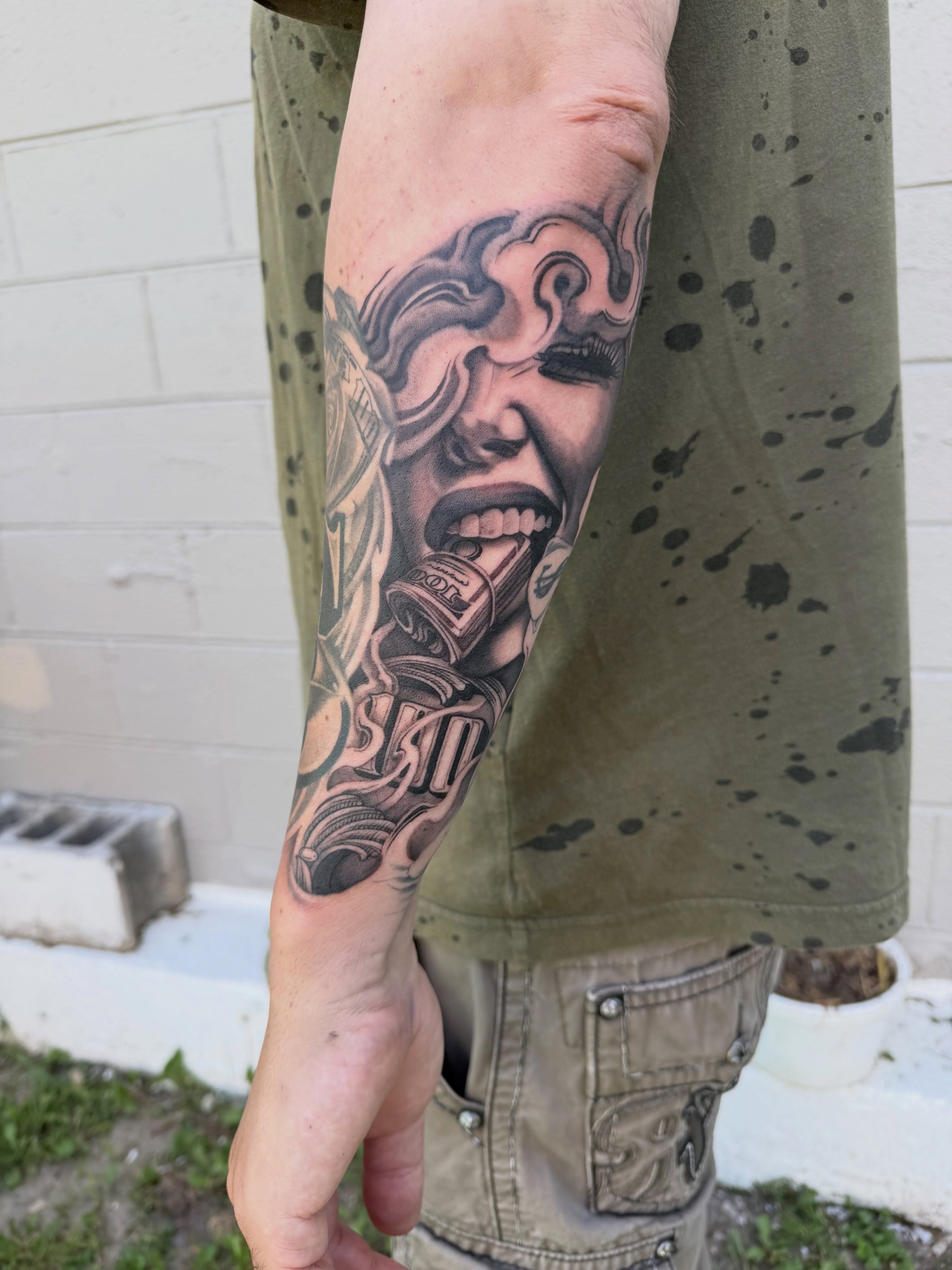 Woman's face realism tattoo on the forearm by Joe Weber, Monona, Wisconsin