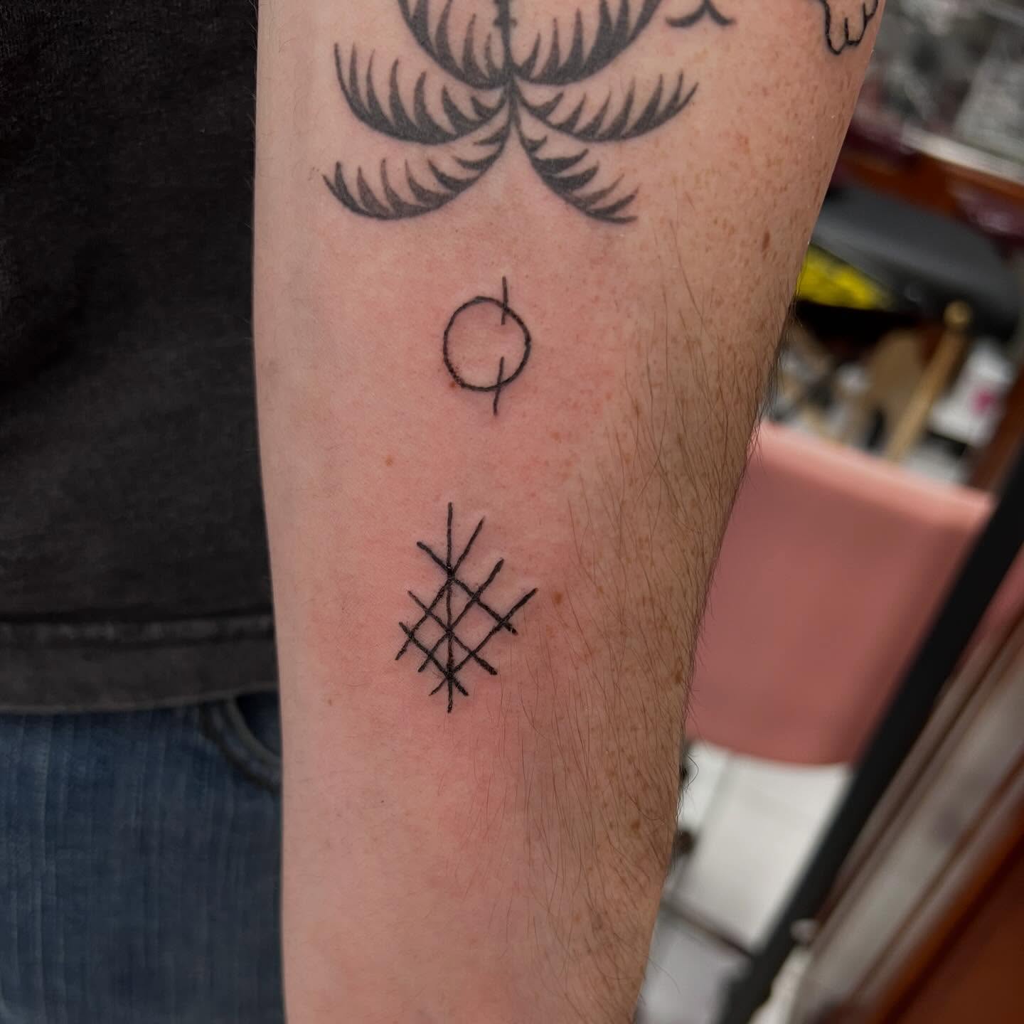 Geometric symbols geometric tattoo on the forearm by Tomfoolery