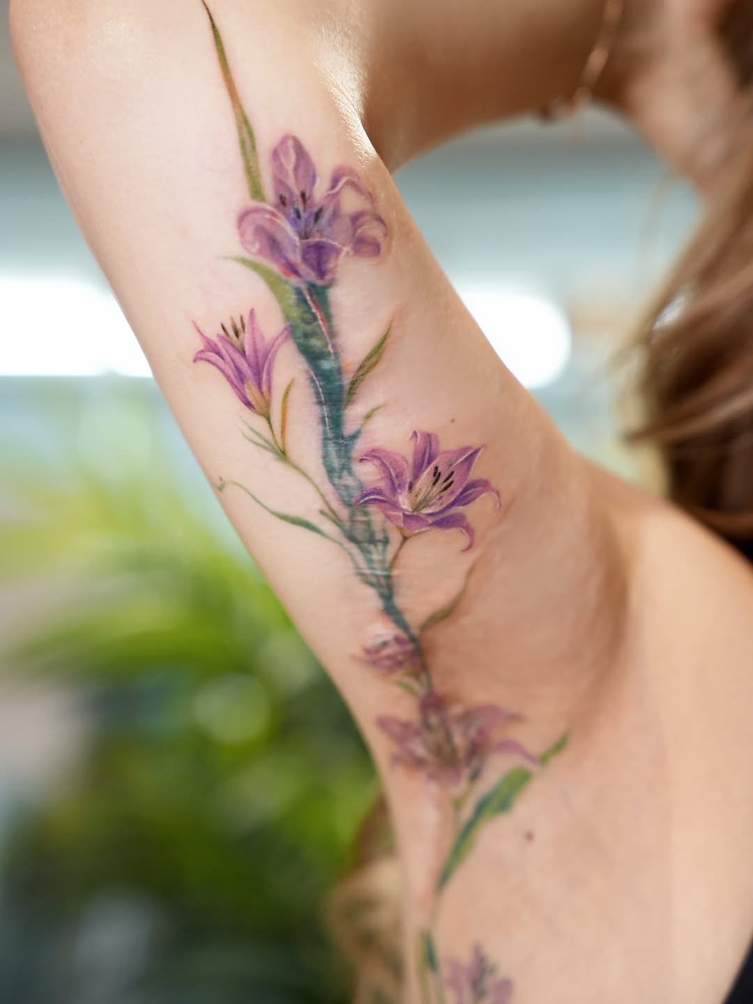Purple lilies on arm fine line tattoo on the forearm by 𝕁𝕖𝕞, Richmond, British Columbia