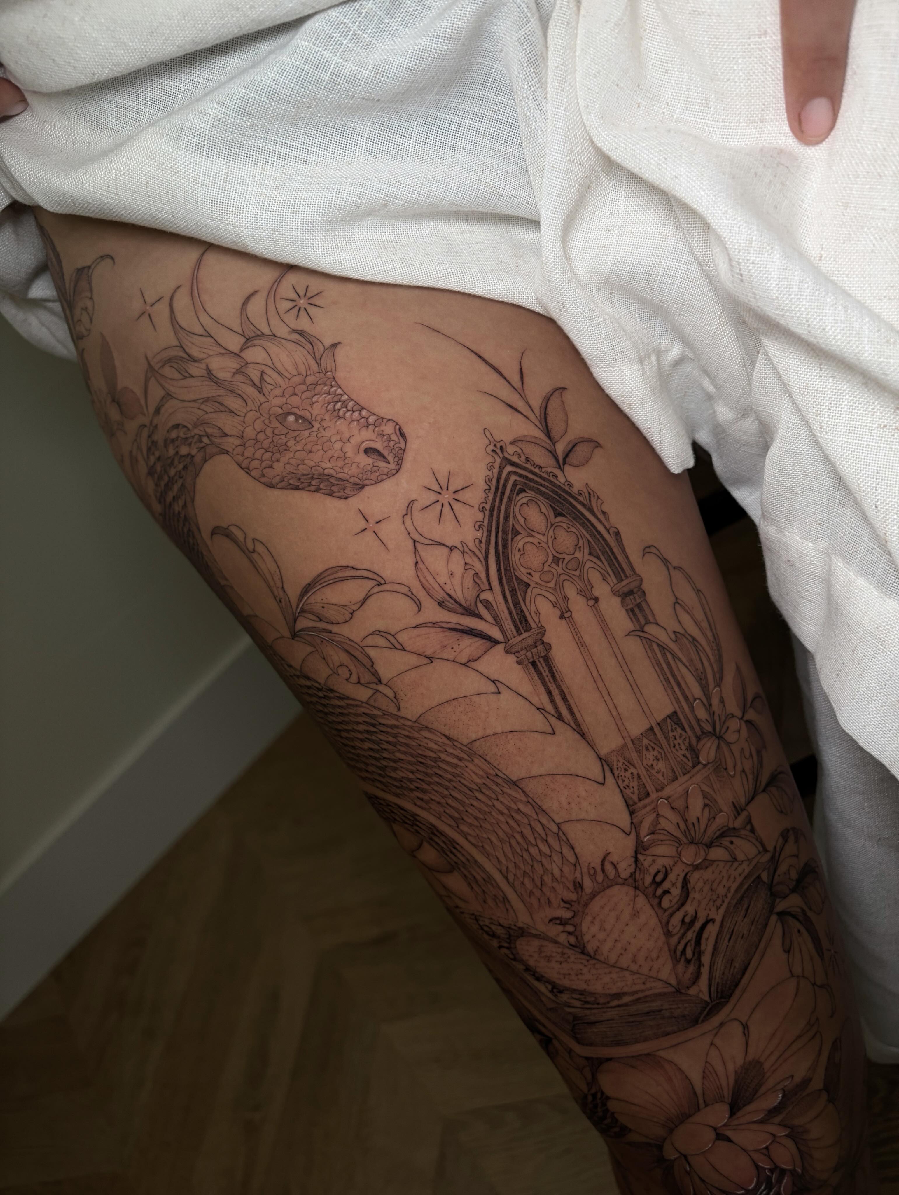 Dragon and cathedral realism tattoo on the thigh by Justene Renee 🖤 Fine Line Tattoo Artist