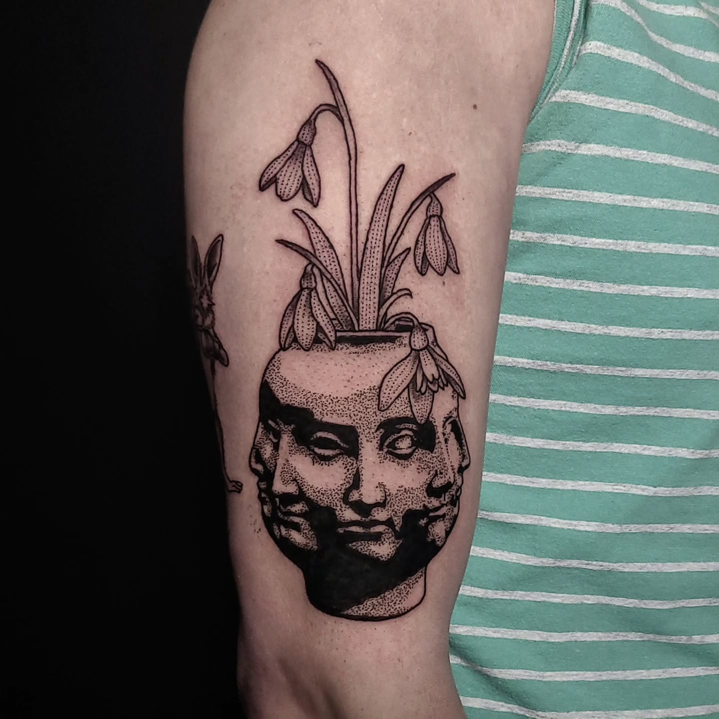 Head with flowers dotwork tattoo on the forearm by Alex Stairs