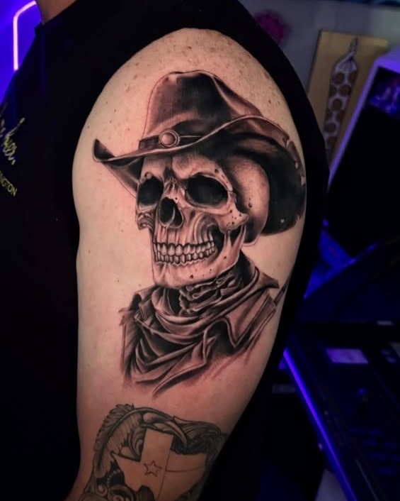 Cowboy skull realism tattoo on the upper arm by Chris_Tatt2_D’Ascenzo
