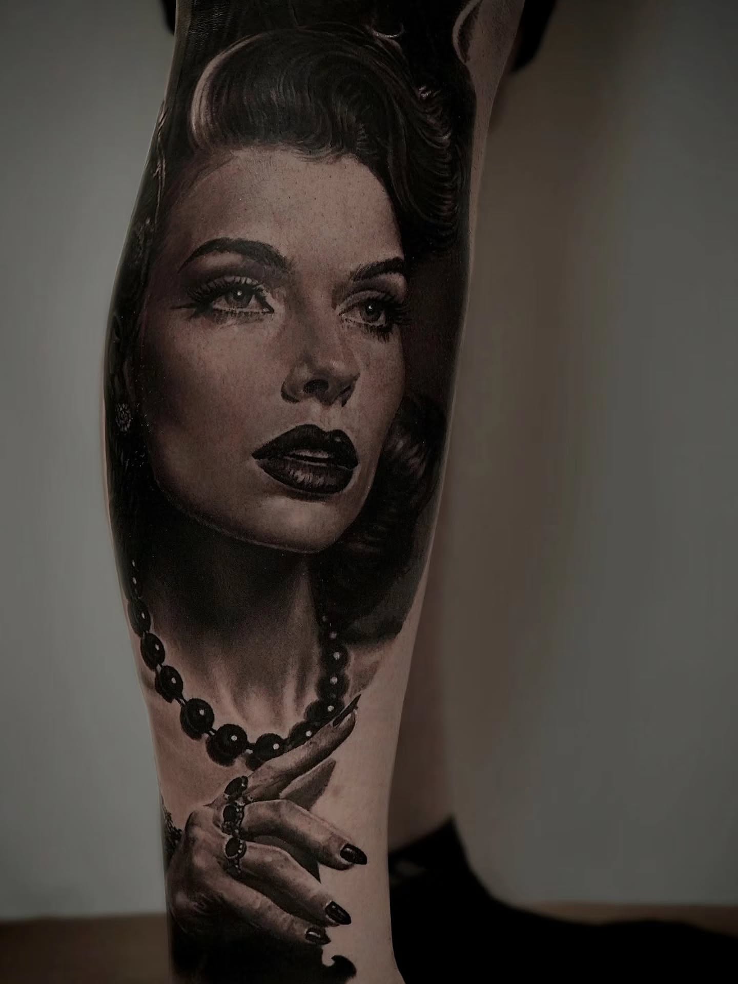 Woman realism tattoo on the forearm by Owen Paulls