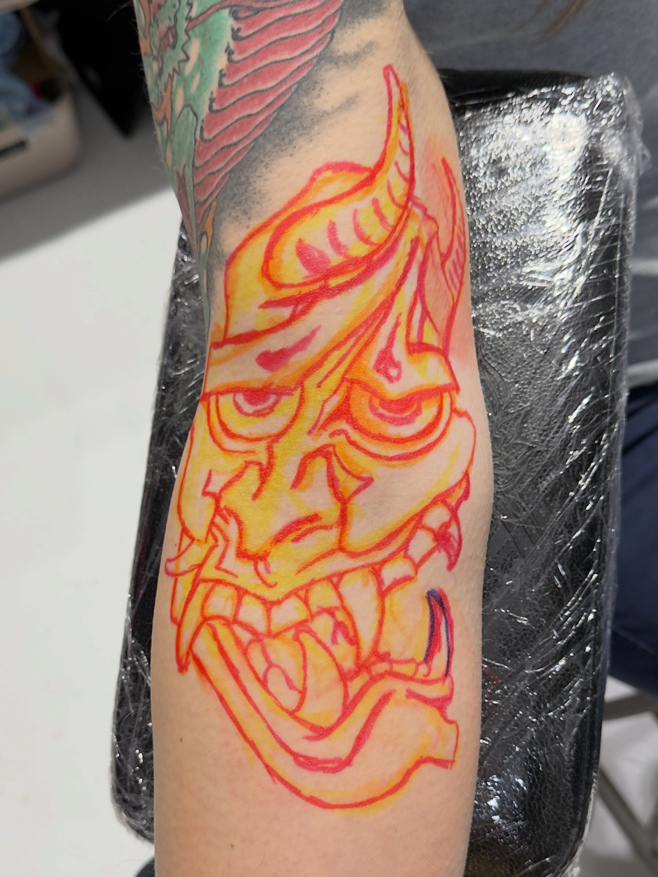 Demon mask japanese irezumi tattoo on the forearm by James Bird, Vancouver, British Columbia