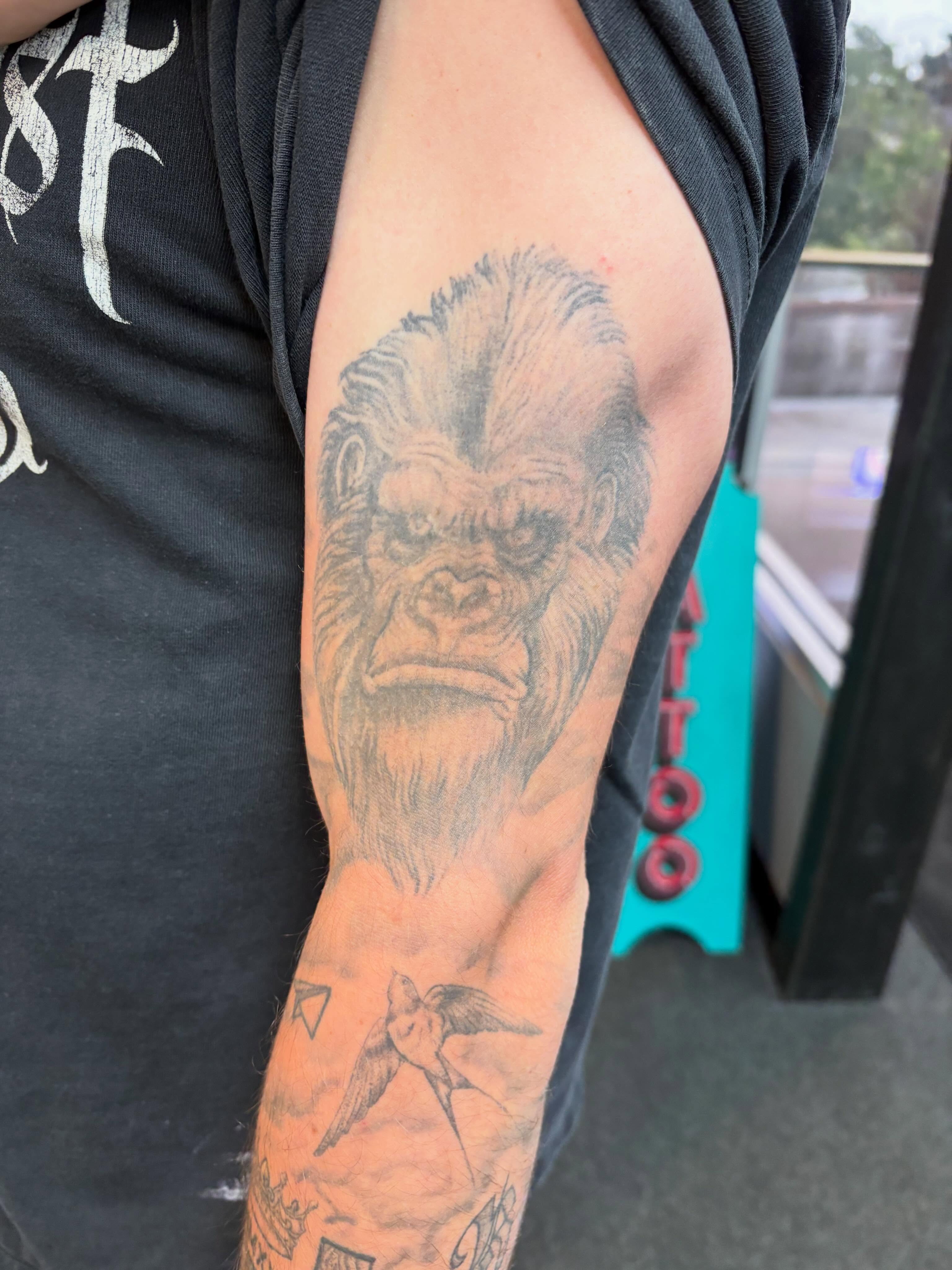 Gorilla realism tattoo on the forearm by Jack Ferreri