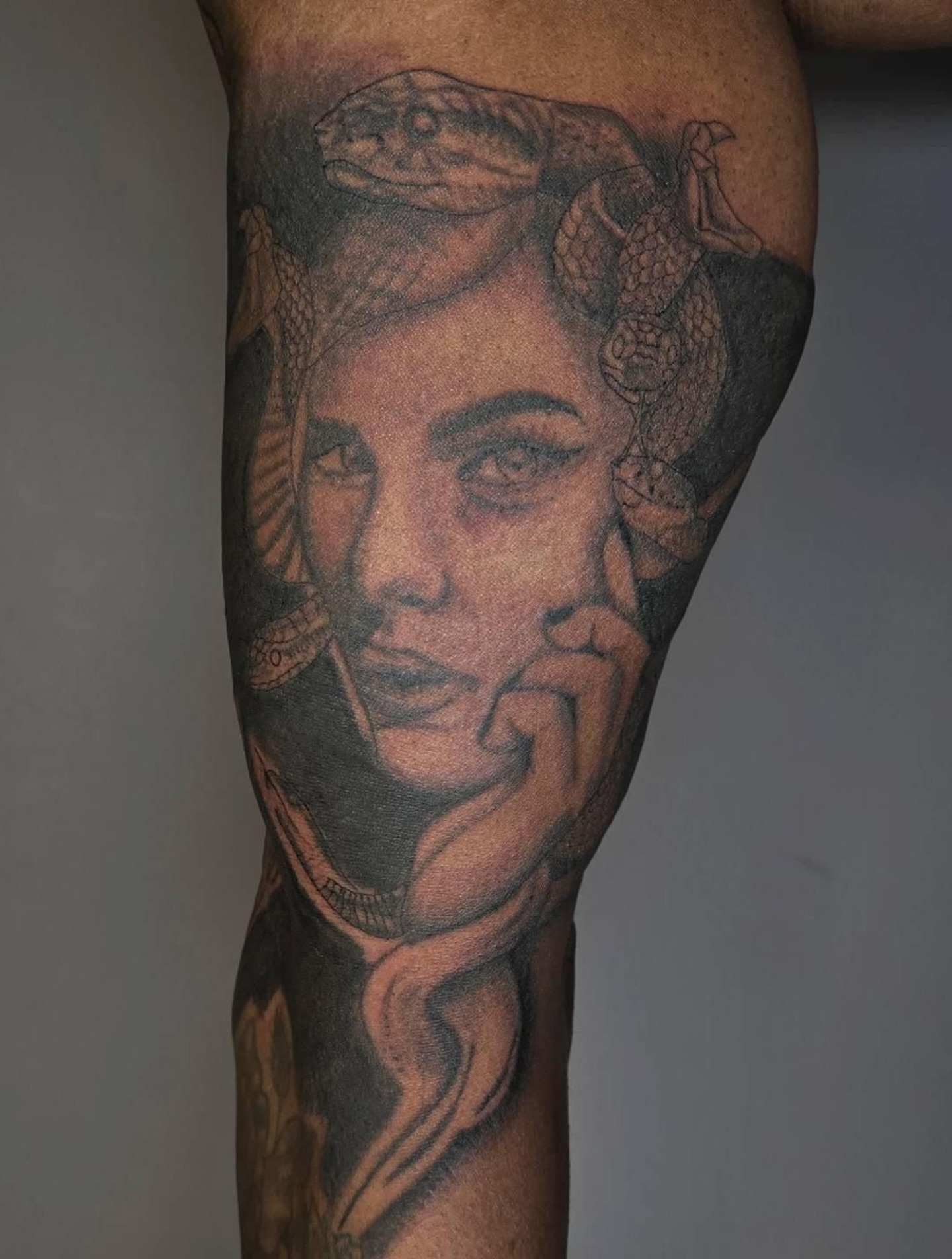 Woman with snake realism tattoo on the forearm by Linda Marroum, Morningside, Maryland