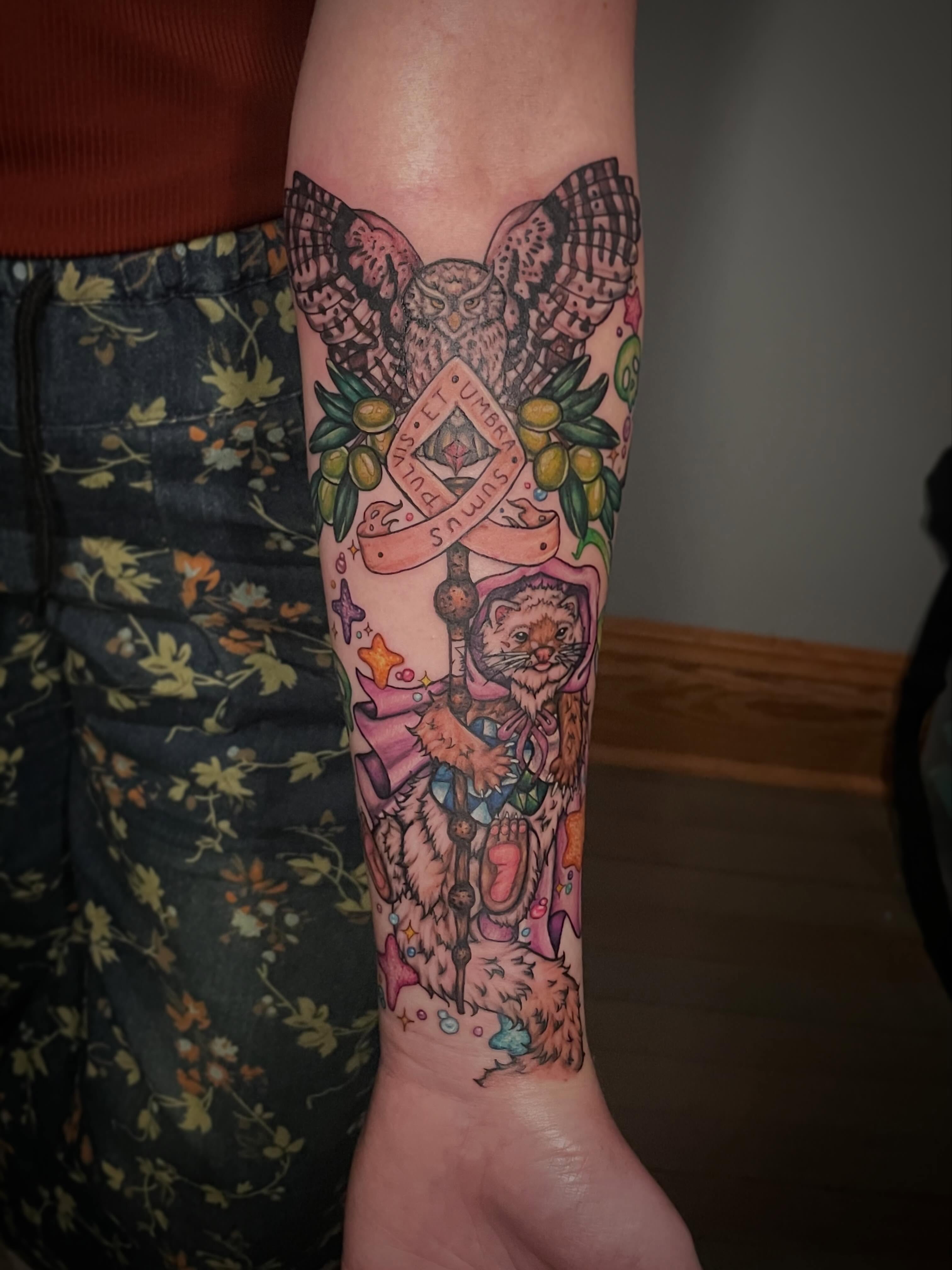 Owl and cat neo-traditional tattoo on the forearm by Hannah Copeskey