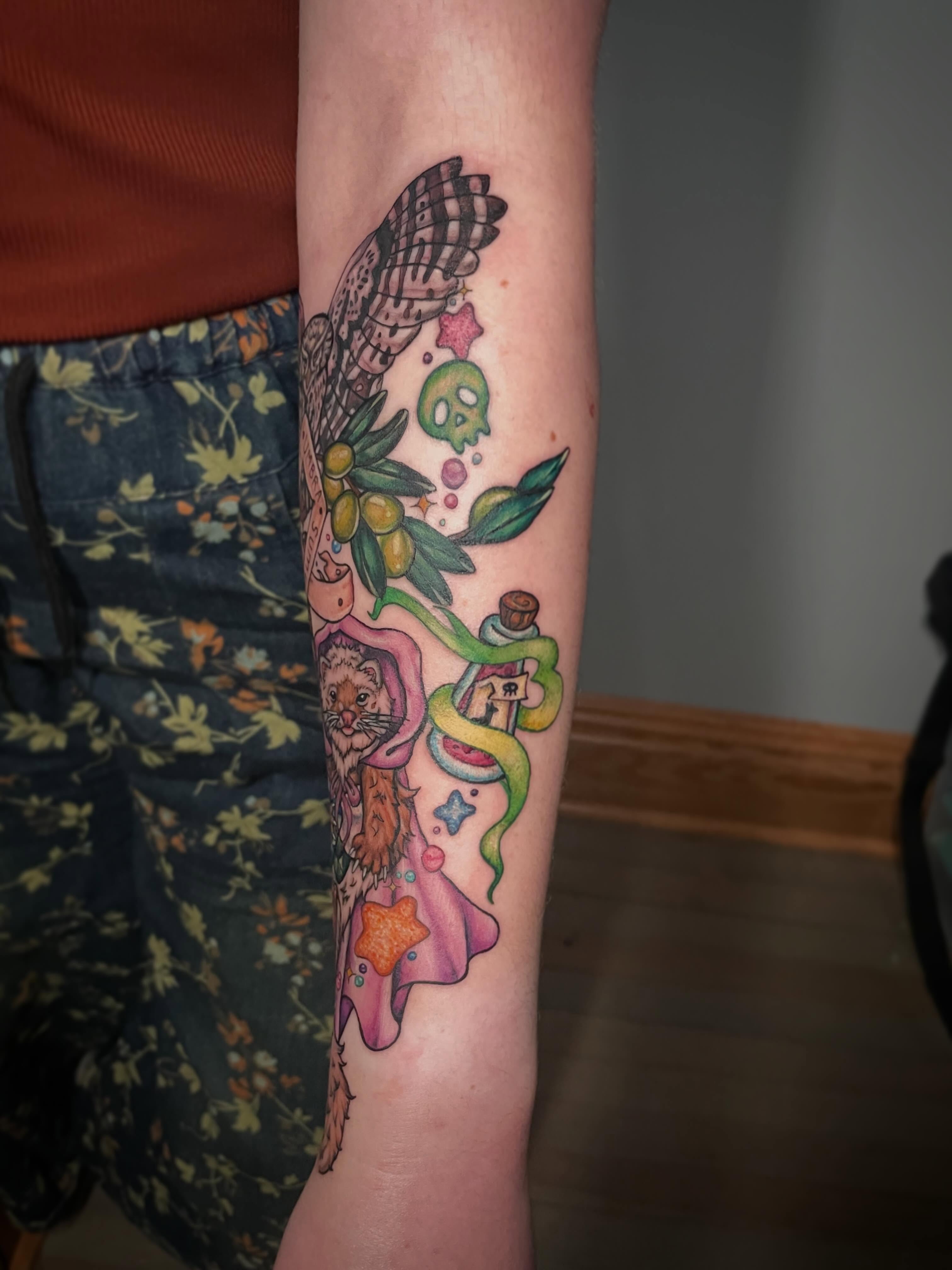 Olive branch and owl new school tattoo on the forearm by Hannah Copeskey