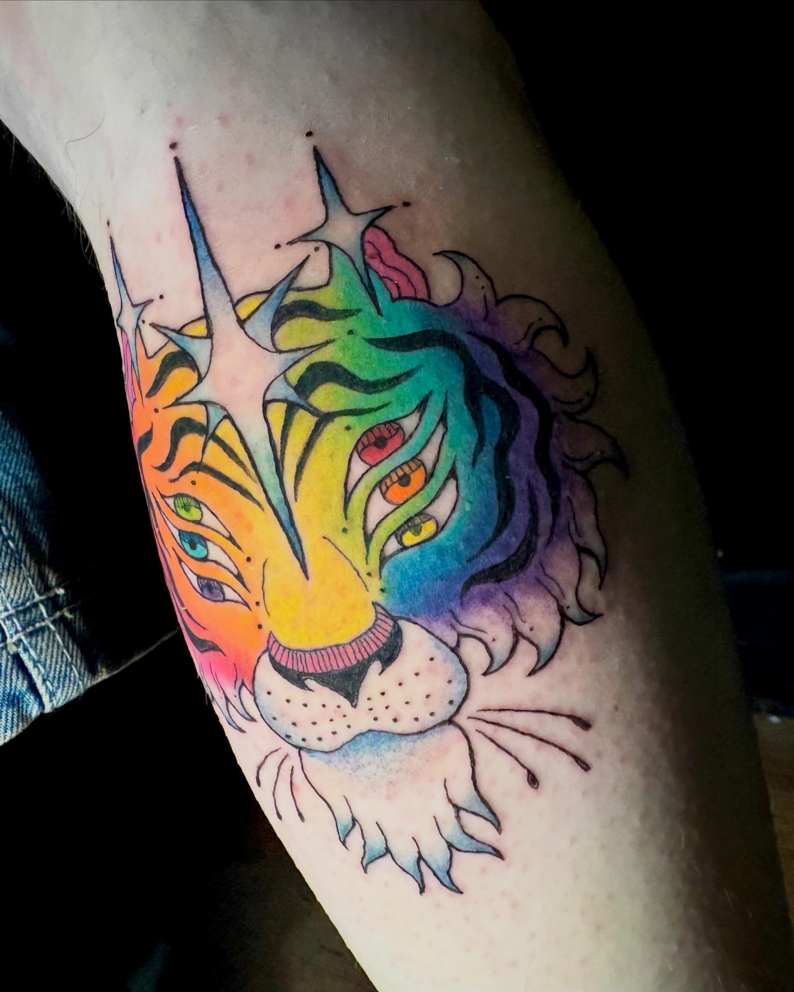 Rainbow tiger new school tattoo on the forearm by Abby Ruok, Midvale, Utah