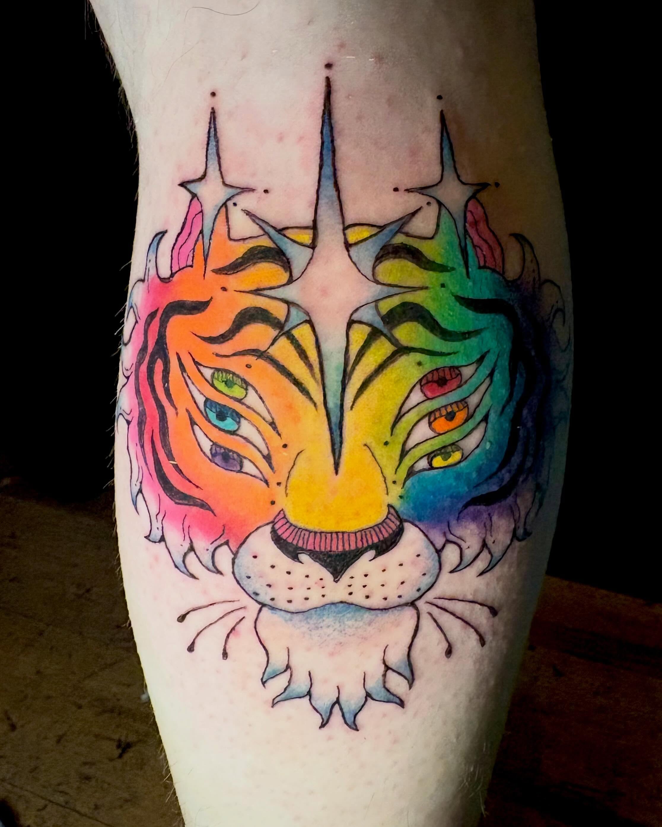 Tiger watercolor tattoo on the forearm by Abby Ruok, Midvale, Utah