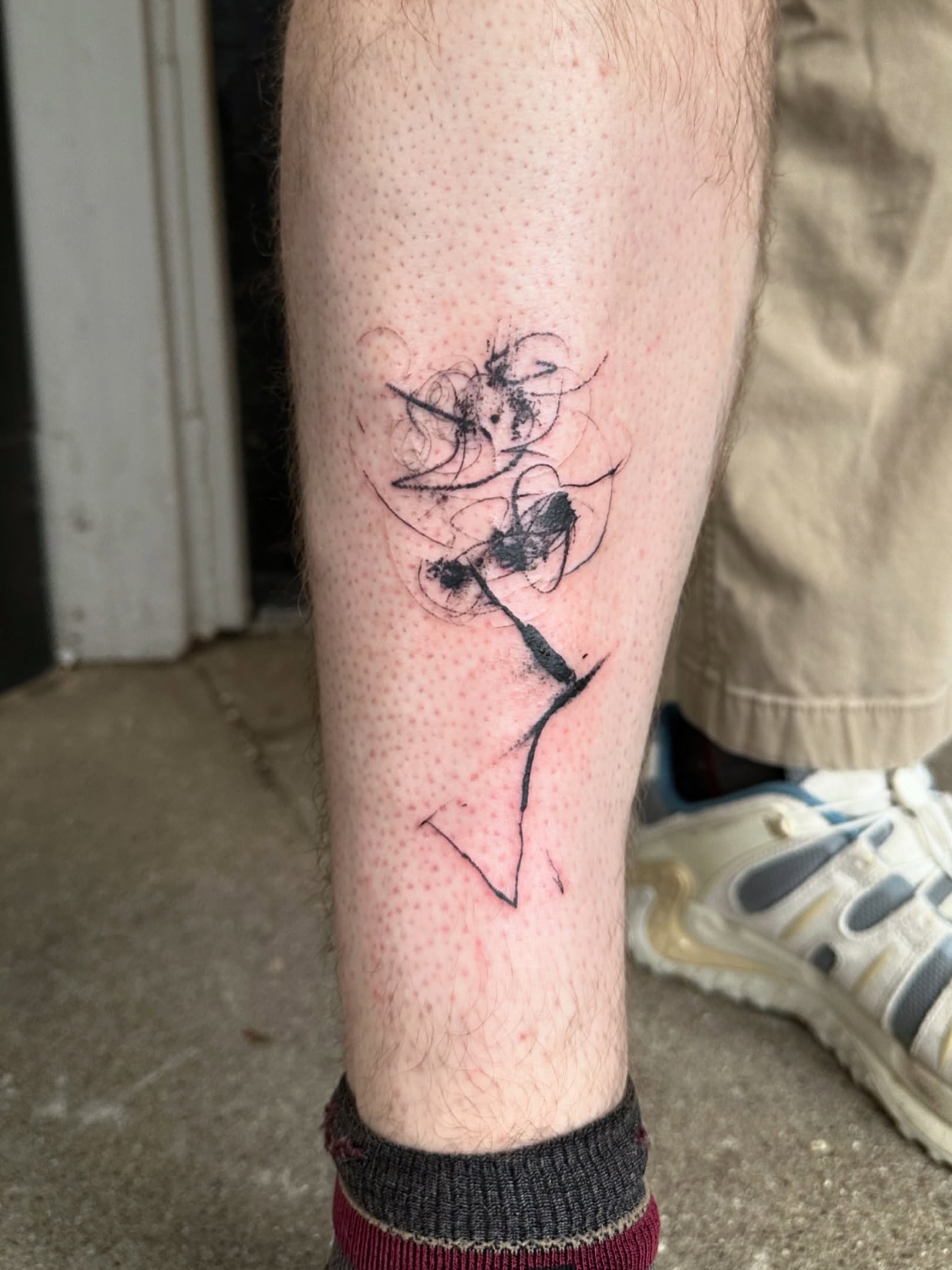 Abstract figure dotwork tattoo on the forearm by reid - tattoo artist