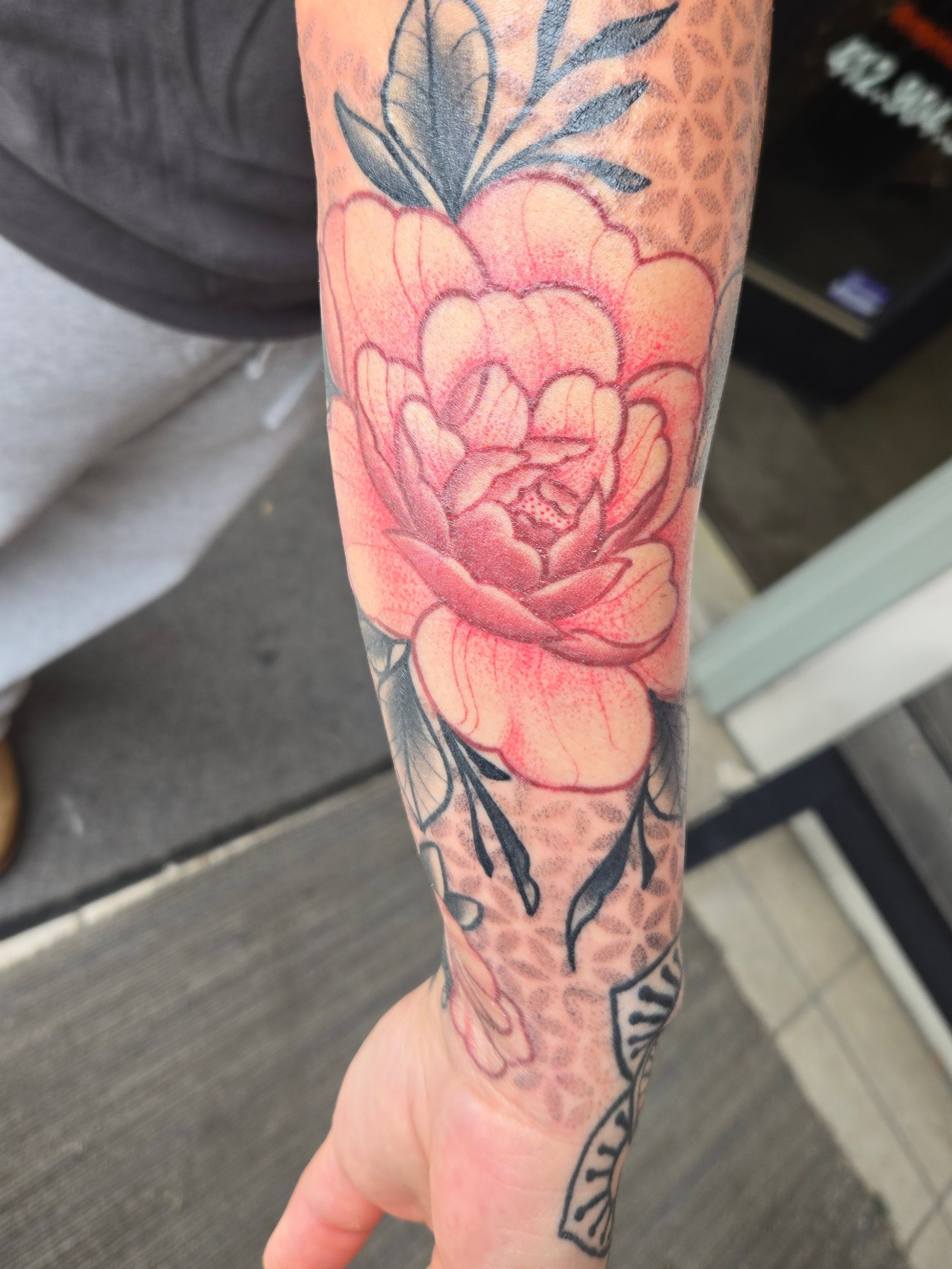 Peony realism tattoo on the forearm by Angel O'Connor Tattoos